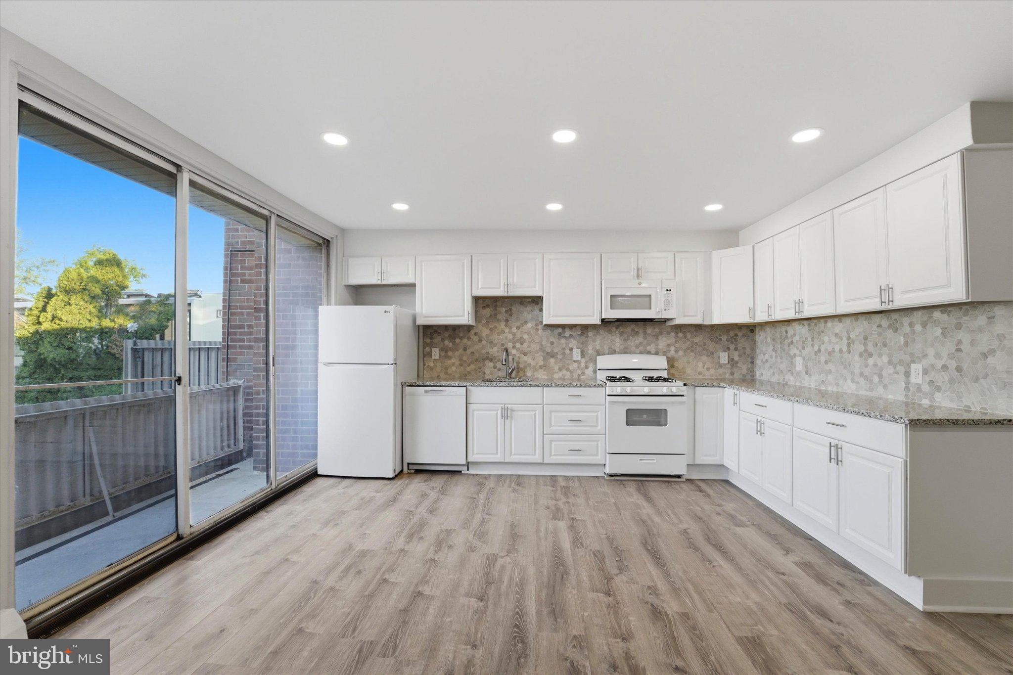 Brand new renovated condo in the sought-after Contemporary Villages Condominium Association! This 1 bed 1 bath unit offers modern comfort, maintenance-free living and excellent community amenities, all in a convenient Glenolden location. Enter Unit R10, tucked away off street through a tree-lined courtyard, to discover new luxury vinyl flooring and fresh paint throughout. The open concept kitchen/living room provides space for relaxing and entertaining, with recessed lights creating a bright and inviting atmosphere. A sliding glass door leads outside to a private balcony overlooking the community pool. The kitchen has been completely remodeled including new cabinets, countertops, backsplash, and appliances. The spacious bedroom offers comfort and privacy, and the full bathroom has been upgraded with a new vanity and fixtures. Enjoy year round comfort with baseboard heat, A/C wall unit, and a convenient in-building laundry room. Located in the Contemporary Villages community, residents enjoy access to amenities throughout its' 12 acre grounds including two swimming pools, a tennis court, landscaped courtyards, walking paths and ample parking. The association takes care of exterior maintenance, snow & trash removal, water and lawn care, enabling your low-maintenance lifestyle. Situated close to local shops, restaurants, parks, Philadelphia International Airport and public transportation including SEPTA's Glenolden Train Station and bus route on Chester Pike a short walk away, this condo is ideal for commuters and anyone seeking convenience and value. Whether you're a first-time homebuyer, downsizing, or looking for a turnkey investment property, Unit R10 is move-in ready and full of potential. Priced to sell fast — schedule your tour today!