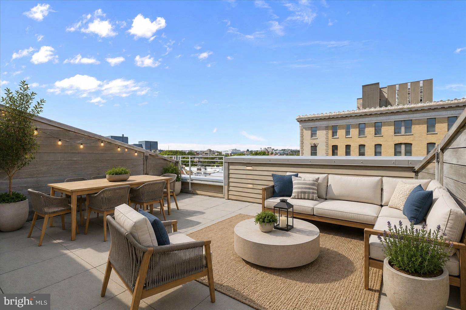 Fantastic new price! Welcome to Penthouse #1 at Logan 13, ideally located just one block from Logan Circle. This stunning 2-bedroom, 2-bathroom condo offers spacious rooms, excellent storage, and a private roof deck with incredible city views. Perfect for everyday living and outdoor entertaining, this penthouse combines style, convenience, and the best of Logan Circle living.

The rare private rooftop deck is perfect for hosting gatherings or enjoying quiet evenings. The deck also connects to the community rooftop, offering additional seating, lounge chairs, and grills.

Steps from vibrant dining, boutique shopping, and Metro access, this penthouse offers unmatched luxury and convenience. One garage parking space and storage unit convey. *Virtually Staged