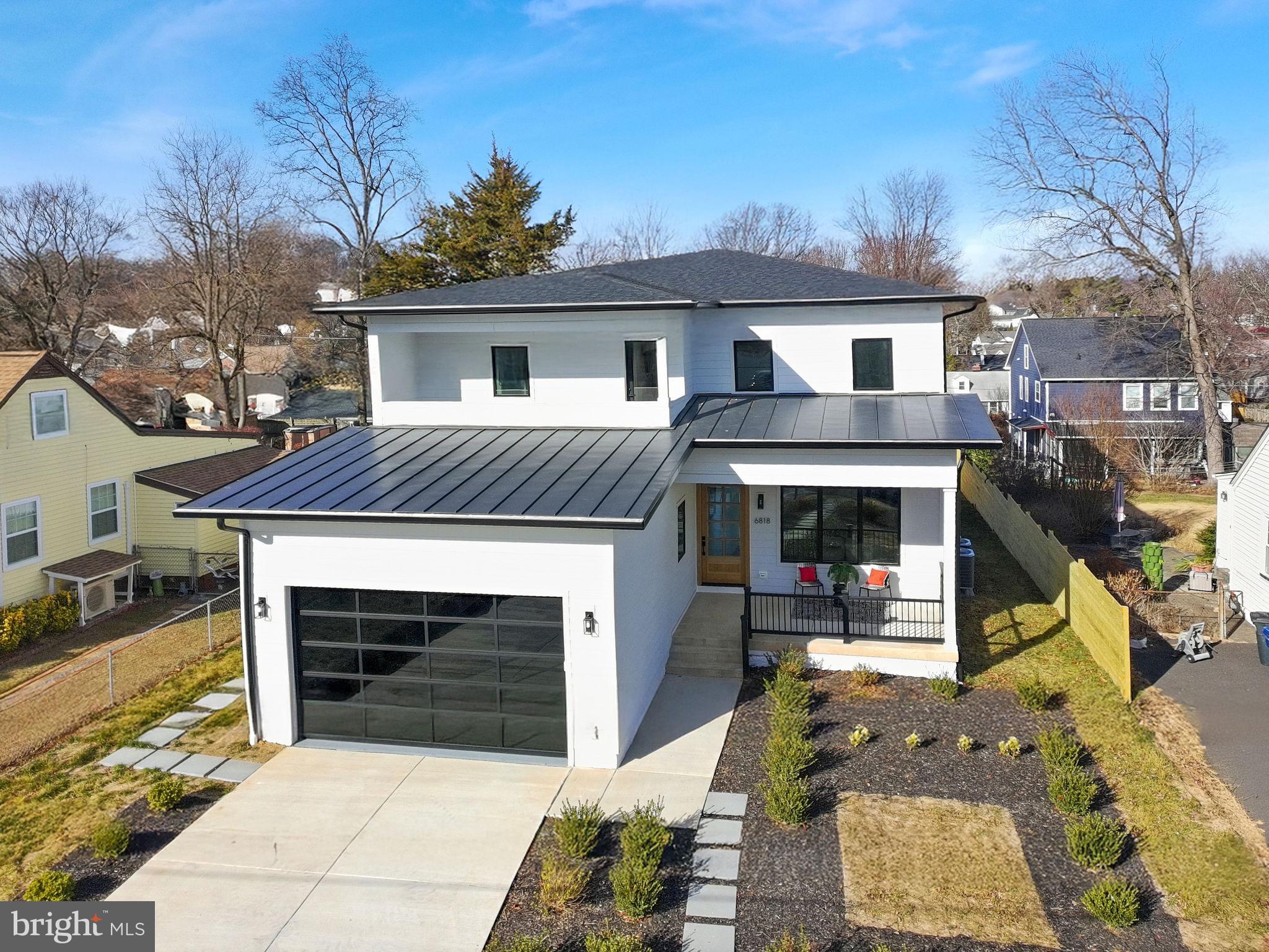 Fabulous New Construction - Ready for Occupancy in the Heart of West Falls Church!
This exceptional custom home blends modern luxury with timeless elegance in the sought‑after Bel Air/Westlawn neighborhood. Offering three beautifully finished levels, this residence features an owner’s wing with a private balcony, a stunning gourmet kitchen, and a serene, landscaped private fenced lot designed for both relaxation and entertaining.
Welcome friends and family from the oversized covered porch through a custom‑fitted hardwood front door into a gracious foyer adorned with soaring 11ft coffered ceilings, a double coat closet with automatic lighting, and striking wide‑plank white oak floors that flow throughout the main level. To the left, a main‑level bedroom suite with a luxurious full bath and walk‑in shower provides the perfect well placed space for guests.
The hallway opens into the main entertaining areas, beginning with a light‑filled formal dining room that connects seamlessly to an elegant butler’s pantry. This space features a generous serving counter with sink, second dishwasher, and an impressive walk‑in larder, ideal for entertaining and storage. From here, enter the chef’s kitchen—an extraordinary MC3 Design custom kitchen showcasing Level 8 quartz countertops and backsplash, a spacious waterfall island with seating, and custom white soft‑close cabinetry extending to the coffered and suspended ceilings. Layered lighting, including under‑cabinet and pendant lighting, enhances the ambiance, while the Thermador Masterpiece Collection appliance suite—featuring Wi‑Fi‑enabled double ovens, a 6‑burner gas cooktop, and a beverage cooler—will impress even the most discerning chef.
The kitchen overlooks the breakfast area and great room, creating a welcoming, open flow ideal for everyday living and entertaining. The main level opens to the private fenced backyard with an expansive oak deck, perfect for outdoor dining under the stars. A staircase leads to the landscaped yard with winding paver pathways set within a beautifully treed setting.
A cascading LED staircase illuminates each step as you ascend to the upper level, which offers four bedrooms, all with attached bathrooms, hardwood flooring, and a convenient separate laundry room. The owner’s wing is a true retreat, featuring a private balcony, sitting area, spa‑inspired bathroom with rain shower and freestanding soaking tub, dual vanities, and an expansive walk‑in closet with custom built‑ins and space for an island. Three additional spacious bedrooms with LED lighting and generous closet space complete this level.  
The lower level offers even more versatile living space with a walk‑up exit to the side yard. This level includes a spacious recreation room with wet bar and space for an additional wine refrigerator or dishwasher, a media or fitness room, a sixth bedroom suite with full bathroom, and an ideal area for a home office or game room.
This is the custom home you’ve been waiting for—located in a desirable, established West Falls Church neighborhood with no HOA. The location offers exceptional convenience with quick access to East Falls Church Metro, major commuter routes and bus lines, historic Falls Church restaurants and boutiques, Eden Center, 14 nearby parks and bike trails, Mosaic District, Whole Foods and Trader Joe’s at Seven Corners, and premier dining and shopping at Tysons Corner.
Welcome Home!