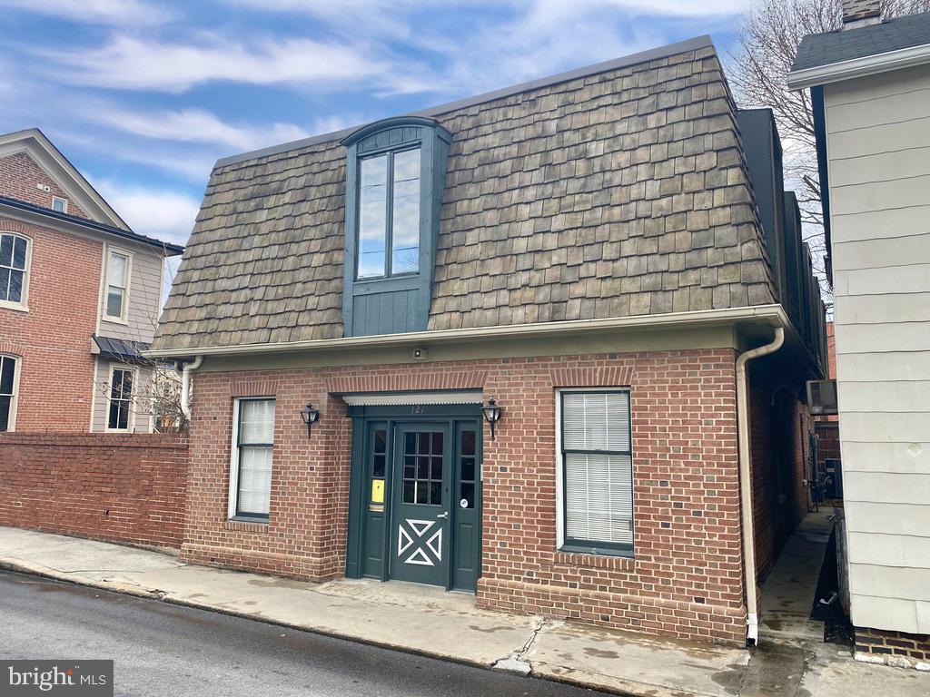 Prime Commercial Space in Downtown Martinsburg!

Are you looking for a smart commercial investment property or the perfect location to establish or expand your business? This well-maintained property was updated and remodeled in 2017 and now features a brand-new roof, adding long-term value and peace of mind. Currently leased to a medical clinic at $1,850/month through November 2025, the tenant will be vacating by year’s end, creating the opportunity for a new owner to either place their own tenants or occupy the space for their own growing business.

With abundant natural light from extra windows, the property is ideal for medical offices, boutique retail, law firms, financial services, or other professional uses. The second level features a spacious open layout, providing flexibility for a variety of configurations.

Just one block off Queen Street and two blocks from King Street, the location offers close proximity to the courthouse, dining, shopping, and all the amenities of downtown Martinsburg. Whether you’re an investor seeking a strong rental property or a business owner ready to secure a prime downtown address, this property is a must-see!