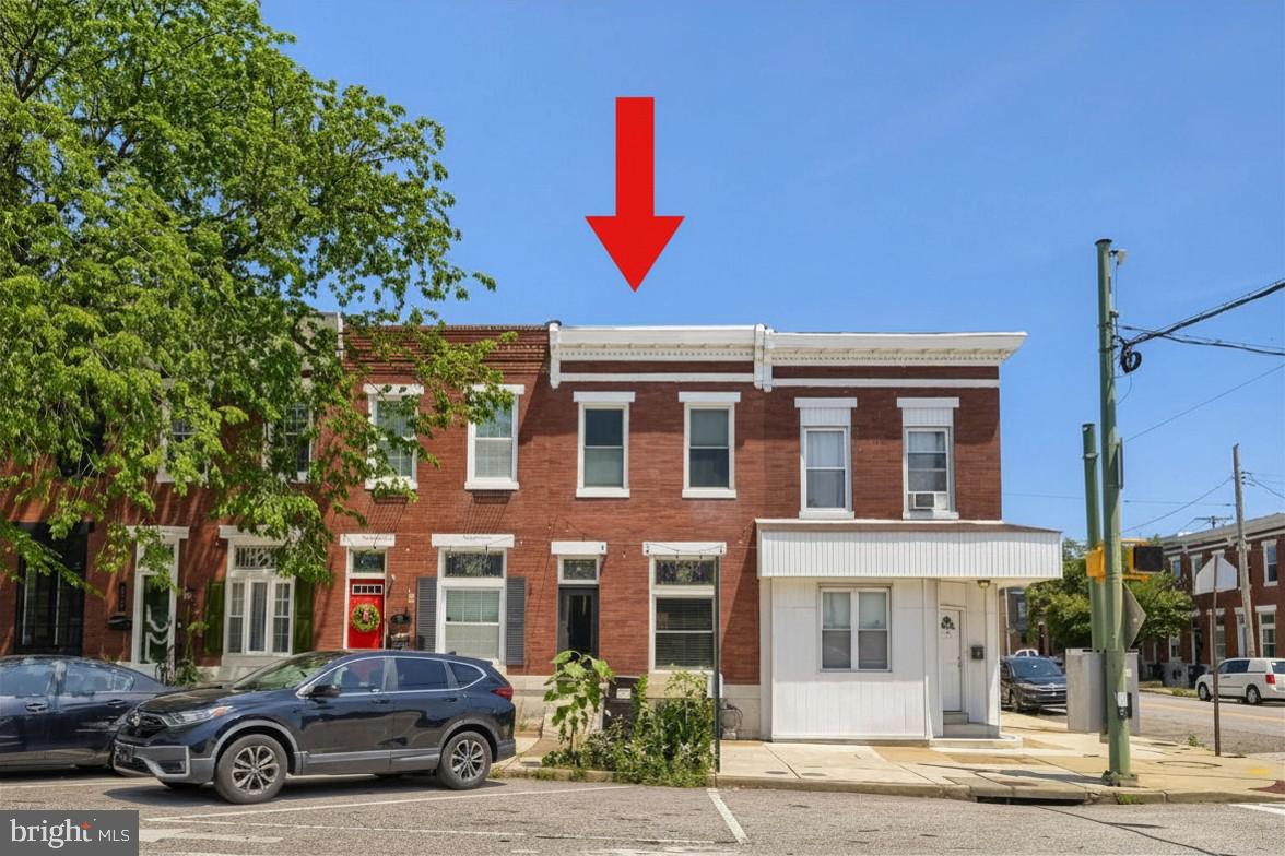 Coming Soon. Open House Sunday July 19th from 10am-12pm.  Welcome to 841 S. Conkling Street, a beautifully maintained brick-front townhome offering 2 bedrooms, 1.5 baths, approximately 1,406 square feet, and the priceless convenience of private off-street parking in the heart of Canton. The original third bedroom has been thoughtfully converted into a spacious walk-in closet and dressing room, with the flexibility to convert it back into a bedroom if desired.
Step inside to gleaming hardwood floors and elegant coffered ceilings that flow throughout the spacious living and dining rooms, creating a warm and inviting atmosphere. A convenient main-level powder room and gourmet kitchen make everyday living and entertaining effortless. The kitchen features granite countertops, stainless steel appliances, ceramic tile flooring, abundant cabinetry, a center island with seating, and plenty of workspace for preparing meals and gathering with family and friends.
Natural light fills the upper level through two skylights. The spacious primary bedroom offers generous closet space, while the second bedroom provides direct access to a private balcony, perfect for enjoying your morning coffee or relaxing at the end of the day. The beautifully converted walk-in closet offers exceptional storage and organization, while maintaining the option to restore the home’s original three-bedroom layout. A full bath completes the upper level.
The lower level spans the entire length of the home and offers incredible flexibility with abundant storage, a laundry area featuring front-loading washer and dryer, walk-out access to the rear parking pad, and an existing toilet providing the opportunity for a future bathroom expansion.
Recent improvements, including a new HVAC system and new front door, provide added value and peace of mind.
Outside, enjoy the convenience of your private rear parking pad, an amenity that’s truly priceless in Canton. Ideally located just minutes from Canton Square, Patterson Park, the Canton Waterfront, Johns Hopkins, shopping, restaurants, breweries, nightlife, and major commuter routes including I-95 and I-895, this move-in ready home offers the perfect blend of historic charm, thoughtful updates, abundant storage, flexible living space, and exceptional city convenience.