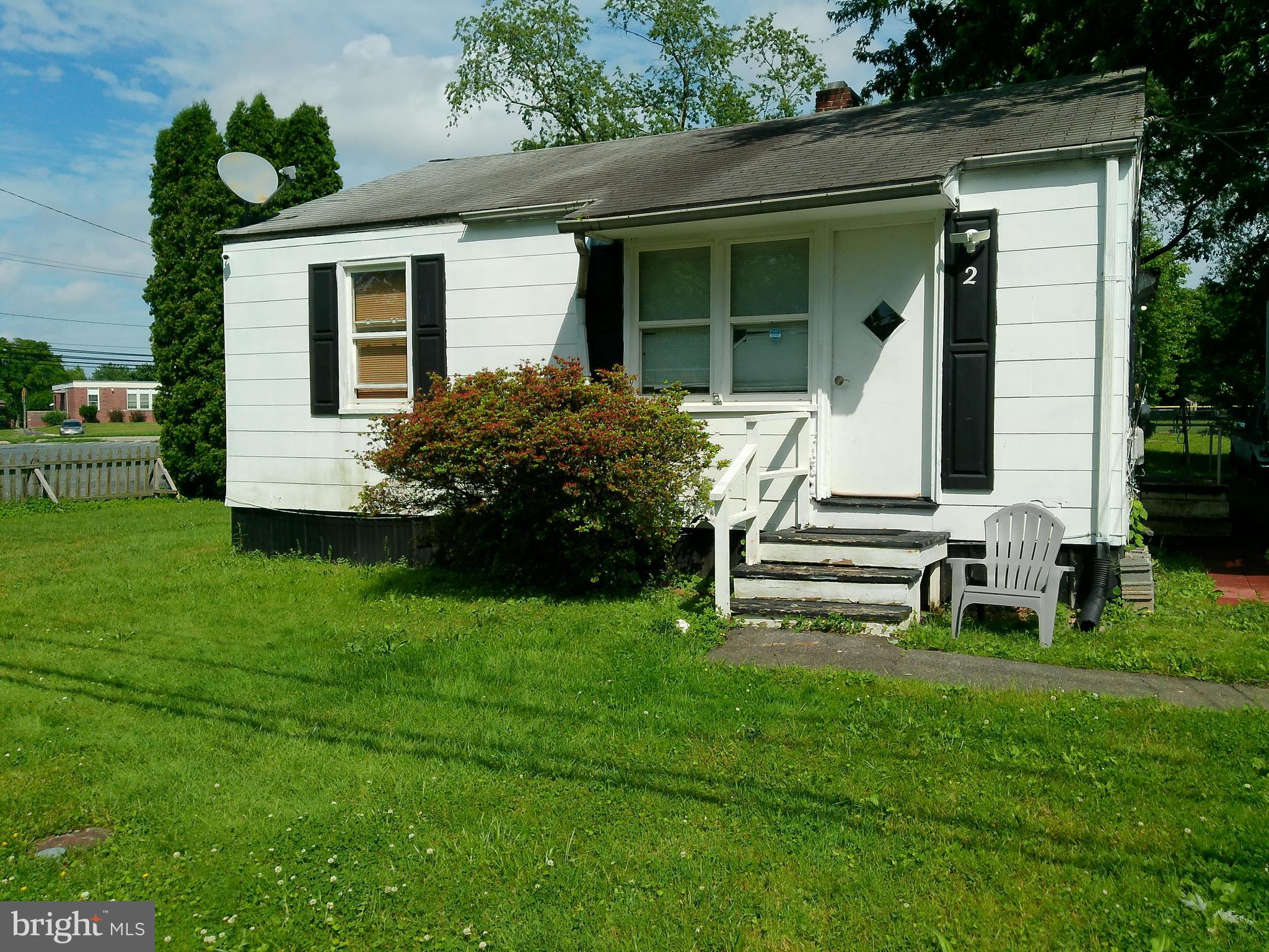 Move in Ready Income Producing Bungalow with a finished "she-said". Both owner occupants and invetsors welcome. Spacious corner lot backed to trees and baseball field. Currently set up as 3 bedrooms. Living room has been converted into a bedroom but wall can be removed if buyer prefers to covert back into a living room. All 3 bedrooms currently being rented month to month. $650 each.