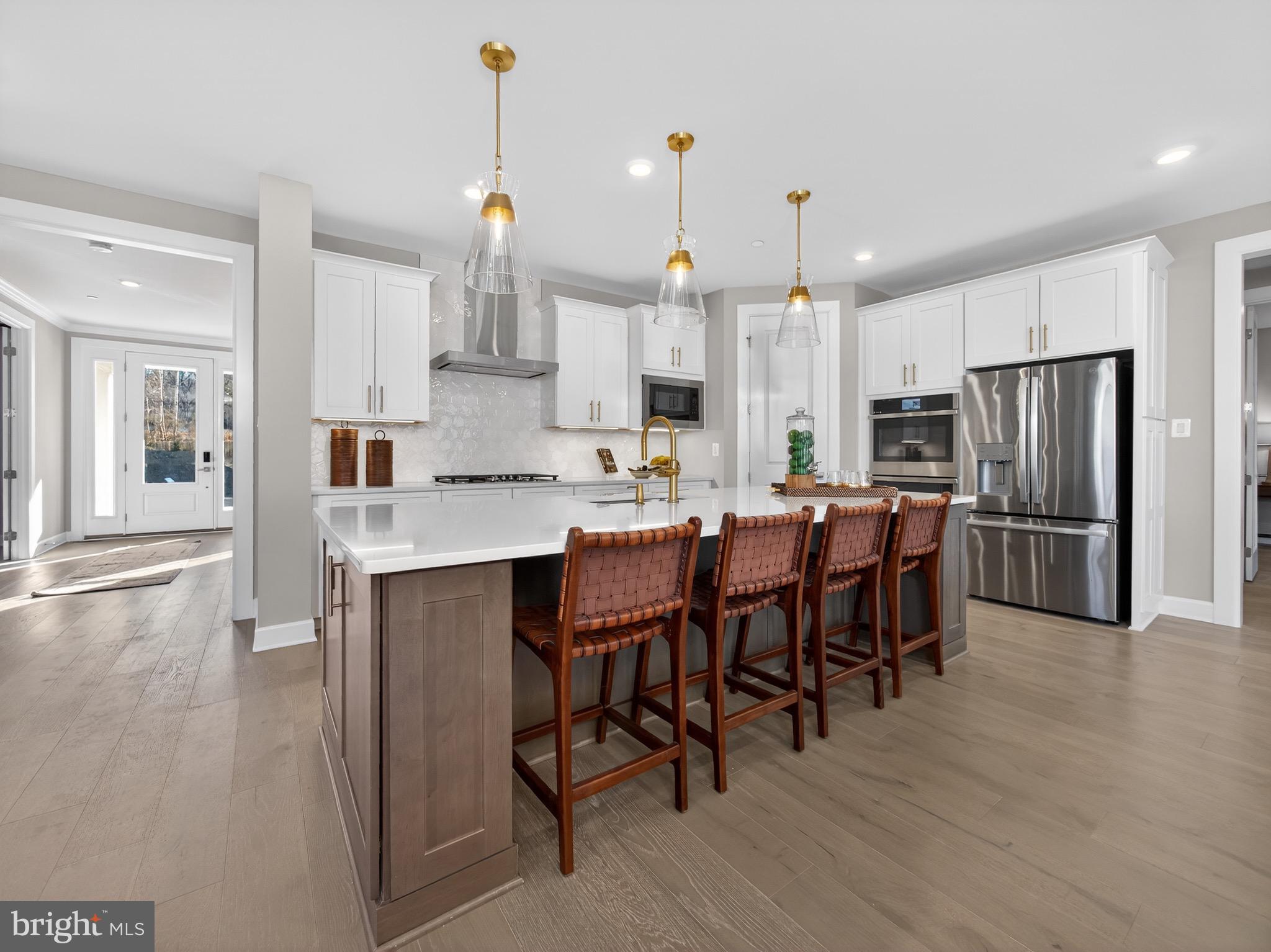 Builder Model + Seller Offering 2 Discount Points – Rare Opportunity in Exton Walk. Seller offering credit equal to two discount points toward interest rate buy-down, potentially extending buyer purchasing power by approximately $75,000 depending on financing.

Have you ever walked into a model home and thought, I wish I could move in exactly like this? Now is your chance. The beautifully appointed sales model at Exton Walk is officially available. Moving into this distinguished community could be just the thing you need to create the 2026 of your dreams!

Just minutes from Exton Town Center, this exceptional home places shopping, dining, and everyday conveniences right at your fingertips. Located within the highly ranked West Chester Area School District, it offers not only a stunning residence but also the peace of mind that comes with an unbeatable location and community.

This thoughtfully designed home features 5 bedrooms and 4.5 bathrooms, delivering space, comfort, and versatility at every turn. The first floor showcases a chef’s kitchen with high-end cabinetry, stainless steel appliances, and quartz countertops, all seamlessly integrated into an open-concept layout. Two dedicated first-floor offices make working from home effortless for both parents.

Designed for year-round enjoyment, the home is completed by a covered porch with a fireplace, creating a warm and inviting outdoor retreat. The finished basement with 9-foot ceilings makes entertaining a breeze—perfect for holidays, Eagles games, or hosting friends and neighbors.

Upstairs, the owner’s retreat is nothing short of a private sanctuary. The second floor also offers ample space for family and guests, including a Jack-and-Jill bathroom and a charming princess suite.

This is truly an entertainer’s dream in one of Exton’s premier communities.
Schedule your private appointment today and start 2026 in a home that has it all—style, comfort, and location.