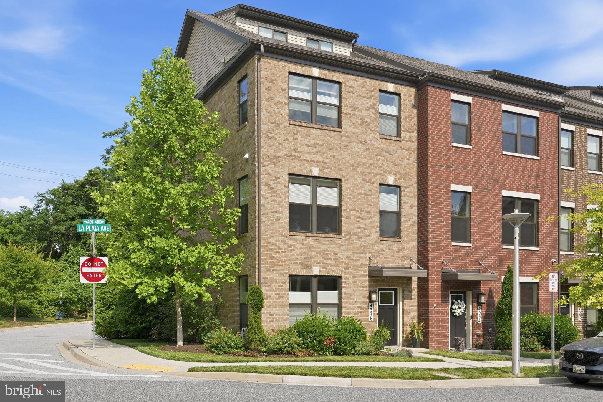 This stunning end of group townhome located in the coveted Medfield community is a must see. The pride of ownership and keen eye for design is evident from the moment you enter the front door. You will love relaxing in the light filled living room, with LVP flooring. It also includes a full bath for added flexibility on how you can use this first floor space.  The expansive second floor is the heart of the home. The openness allows for seamless entertaining or hosting gatherings. You will be wowed by the gourmet kitchen with quartz countertops, kitchen Island, stainless steel appliances, and a pantry.  Adjacent  is the dining room. The living room enjoys plenty of natural light from the slider leading to the rear deck; upon which you can relax or sip your morning coffee. Due to its unique location in the development, this home doesn't back to another house providing an added level of privacy and making you feel like you are in a park- like setting. You will love to retreat to the spacious primary suite. That includes a sizable walk-in closet, plenty of natural light, an en-suite bath with quartz countertop, dual vanities, and walk in shower. The third floor also includes two additional bedrooms with a hallway bath and the laundry room for added convenience. The fourth floor allows for plenty of versatility. Use it as a home office for those working remote. It can also be used as an extra living space or guest room.  The two-car garage allows for easy secure parking and provides additional space for storage. Easy access to I-83. Short distance to Hampden and "The Avenue". Close proximity to multiple stores and restaurants. Where luxury living and accessibility meet. This is city living at its finest. You don’t want to miss this one.