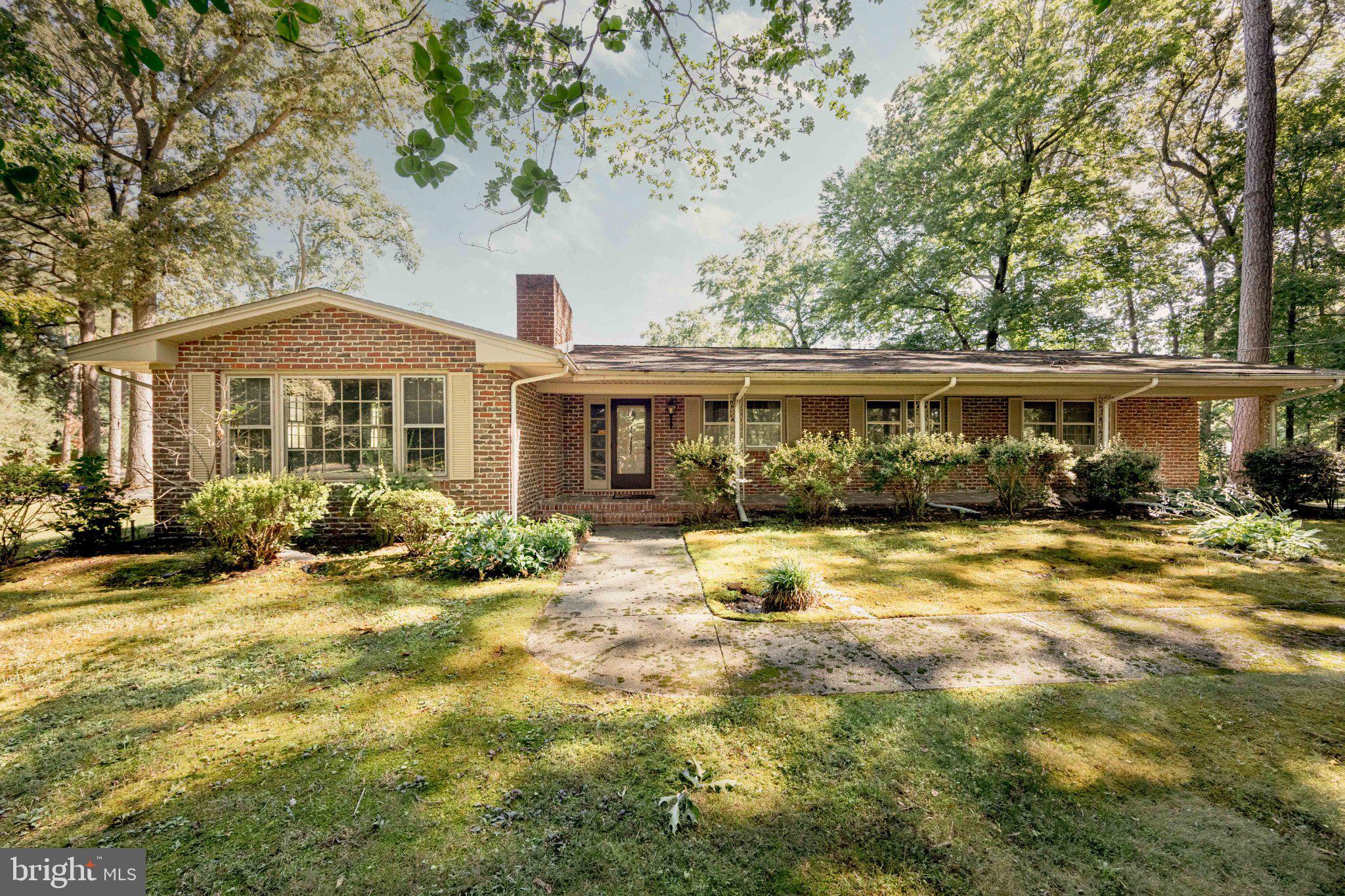 Welcome to 8473 N Prong Ln!!! This Brick Rancher in the well-established, Danwood neighborhood is ready for new owners. The Curb appeal is eye catching as you approach the large front porch. The GAF Architectural Shingles are less than 5 years old.  The old school charm is evident throughout this gem. Featuring a large sunken living room with fireplace, a second den, a formal dining room, and three ample bedrooms, one being an en suite, this 2100 plus sf home has plenty of elbow room for everyone. The hardwood floors are in good shape as well.  Add to that a finished basement that is approximately 1000 SF and has a few separate rooms which add to the endless opportunities. There is a heated 4 season room for relaxing and a large back deck for your enjoyment. The tree lined yard is great for shade and the detached garage gives you plenty of space for outdoor storage or a workshop. Who's going to be the one to breathe new life into this beauty!!!