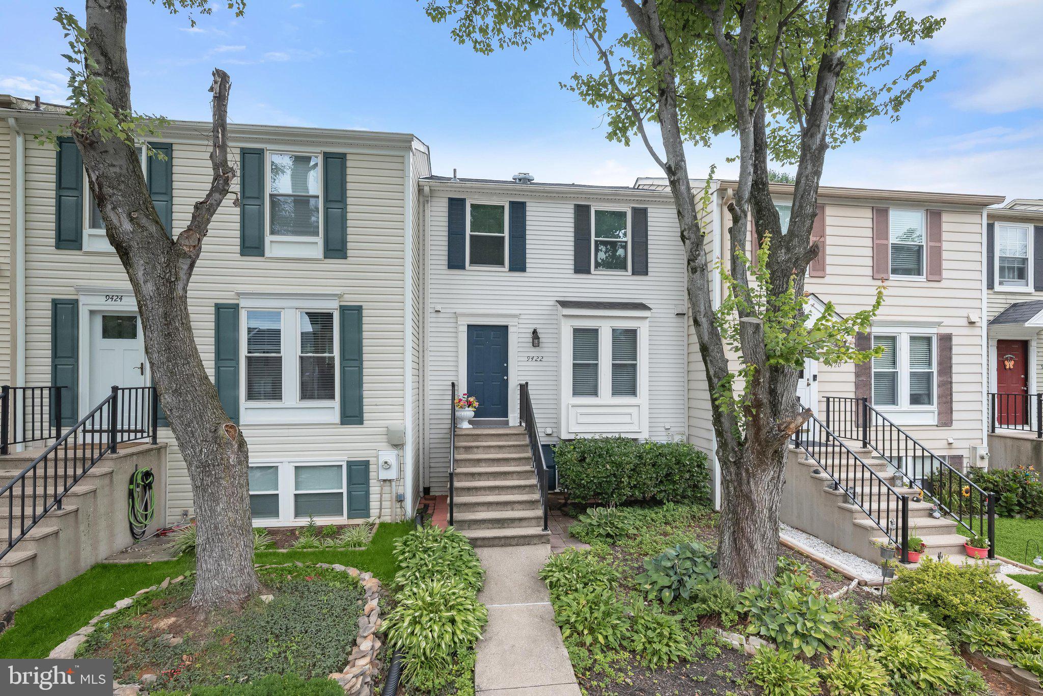 Welcome to this beautifully maintained interior townhome in the highly sought-after Columbia community of Howard County, where comfort, style, and convenience come together. Step inside to hardwood floors that flow throughout the main level, leading into the inviting living and dining areas. Anchored by a charming wood-burning fireplace with architectural detailing, this bright and airy space features a neutral color palette, abundant natural light, and a dining alcove perfect for everyday meals or entertaining guests. The well-appointed kitchen offers a sunny bay window bump-out, ideal for morning coffee, along with a decorative tile backsplash, 36-inch cabinetry, updated appliances, and a ceramic tile breakfast bar overlooking the living area.  Retreat to the spacious primary bedroom featuring plush carpeting, elegant crown molding, double-door closets, and a dual-entry en-suite bath accented with charming beadboard details. The second bedroom is equally inviting with plush carpeting, crown molding, a chair rail, and a generous double-door closet. The fully finished lower level provides exceptional flexibility and can easily serve as a third bedroom, home office, guest suite with a private powder room that could be converted into a full bath, or a recreation room for games, hobbies, and entertaining. Outside, the fully fenced backyard with a private patio creates the perfect setting for relaxing, grilling, or enjoying the outdoors. WIth two assigned parking spaces, and  ideally located near Columbia Town Center, The Mall in Columbia, Merriweather Post Pavilion, and the extensive amenities of the Columbia Association, including miles of walking trails, parks, lakes, pools, fitness centers, and year-round community events, this is a not to be missed property.  Convenient access to US-29, I-95, MD-100, and nearby I-695 makes commuting to Baltimore, Washington, D.C., and surrounding areas effortless.  Updates: Carpet (2026), Roof (2026), A/C, Paint, Sump Pump