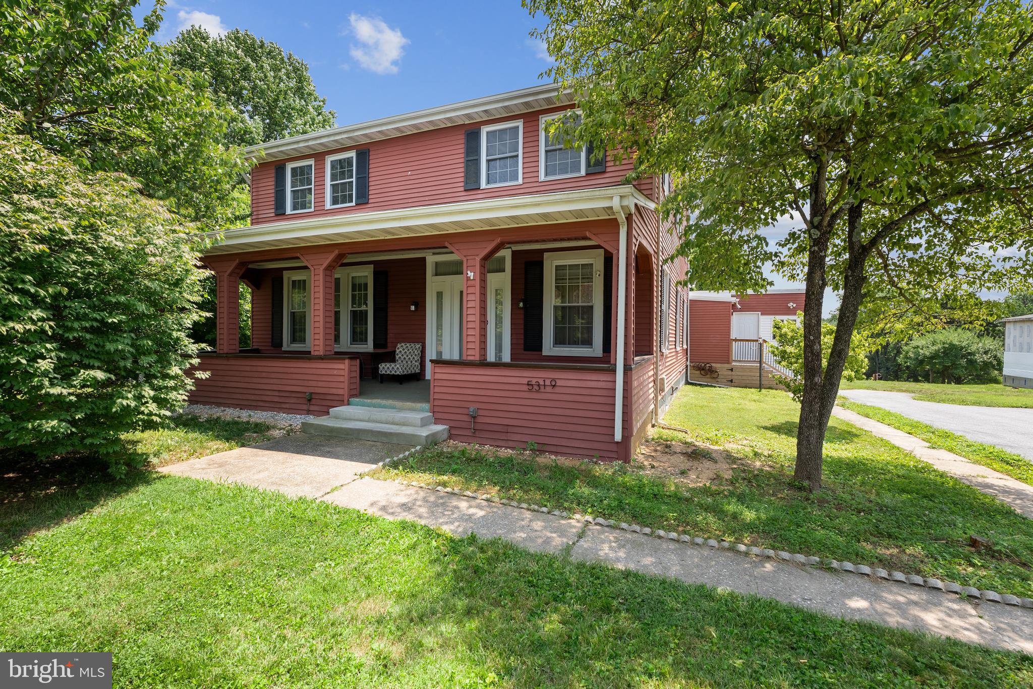 Beautiful 2.44 acres-including the main house there is a very large barn that offers electric, two sheds-If you like outdoor living there is so much room for picnics, games and just relaxing. The main house offers a covered front porch as you enter into the living room, there is a formal dining area. There are two bedrooms on the first floor, a large family room and office. There is one full bath that has been remodeled beautifully  and a second full bath on the first floor.  The second floor offers 4 bedrooms and a full bath (as-is) and a separate eat in kitchen.   The property is in nice condition, there is plenty of living space. The property goes way beyond the house down into the far woods in the back.  Just keep walking to really enjoy the property. The home has undergone some renovations but there is room for you to add your decorating  and remodeling touches. The house is being sold AS-IS, But it is a great value with the home and barn and the extra large 2.44 acres Seller will make a flooring credit for first floor family room.