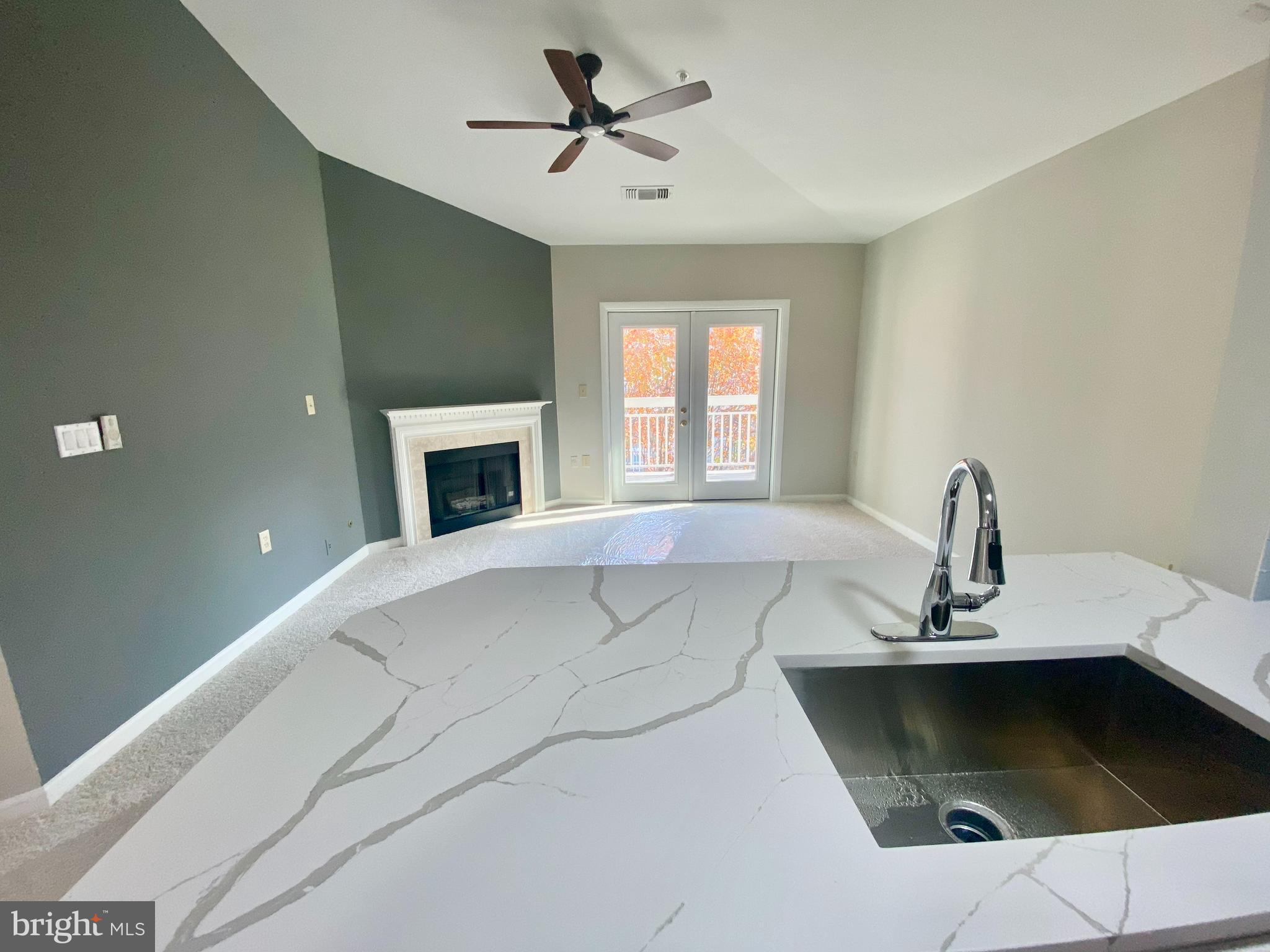 Beautifully renovated 2-bedroom condominium in the sought-after Herndon/Worldgate area. Open concept design featuring a new quartz counter top kitchen, spacious living room,  new bathroom, new lightings, new flooring, paint etc. Washer and dryer in unit.  Comes with one garage parking space (# 11) in the basement right next to the elevator. Owners can obtain a visitor pass at the office, plenty of visitor parking.   Plenty of shopping options, including H Mart, Harris Teeter, and Giant, as well as a wide array of restaurants, movie theaters, and more, are just minutes away.
