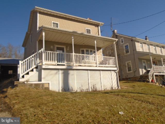 Nice size Home situated on .44 acres. Huge covered front porch and rear patio. Home has been renovated in the past to include kitchen, baths, windows and more !! Main level has spacious living room. Country kitchen has lots of cabinet space. French doors off rear leads to patio and fenced rear yard. Upper level Has 3 generous size bedrooms and 2 full baths.  Minutes  to Union Mills Park and  Charles Carroll Elementary School.  Agents please see documents on this listing and agent remarks for contract details.