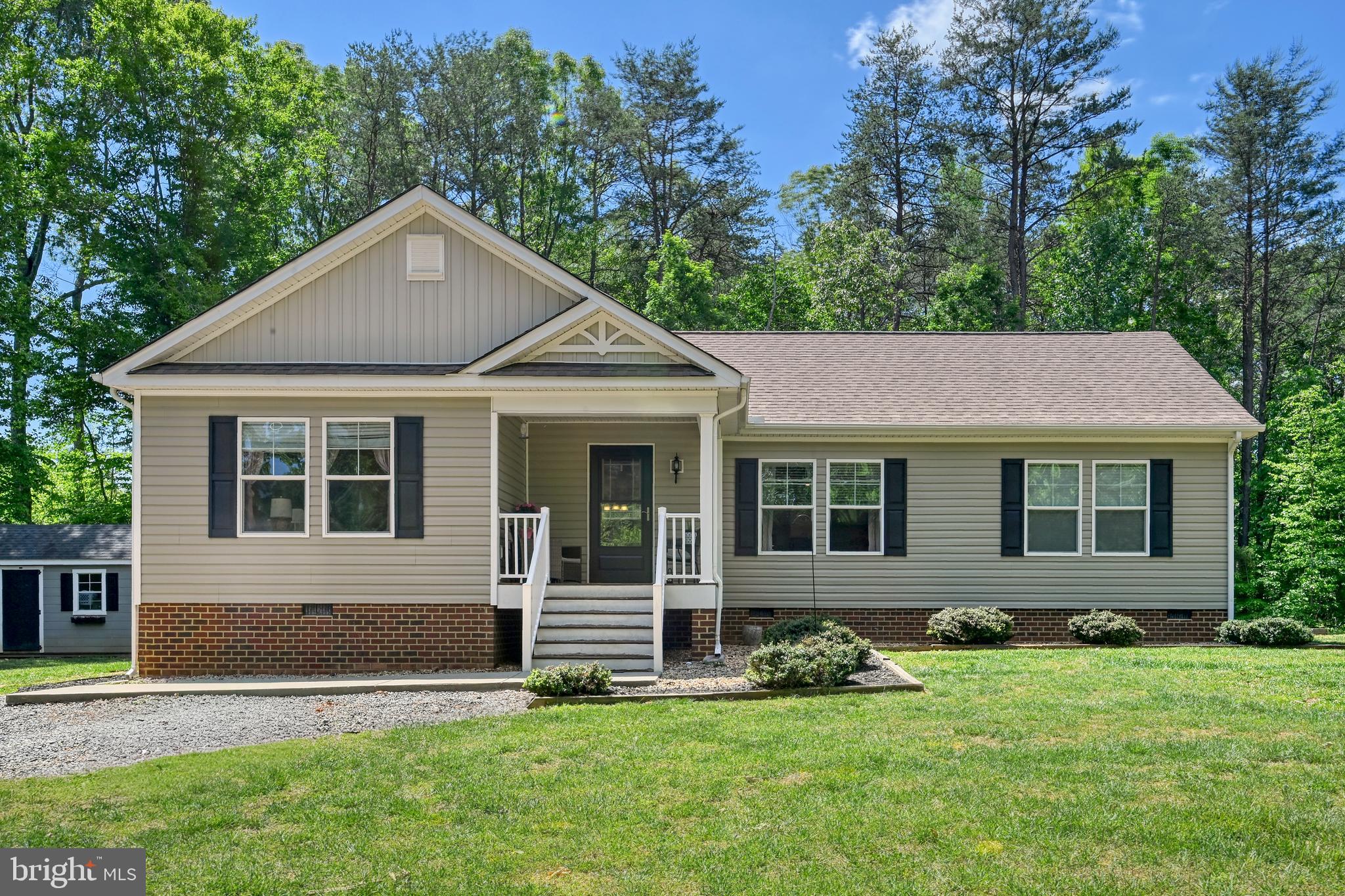 Welcome to country living in this charming ranch home situated on 1.7 private acres! The open-concept floor plan is perfect for entertaining and everyday living, featuring an eat-in kitchen with a large island, abundant cabinet storage, and newer appliances. Just off the kitchen are both the living room and family room, offering plenty of space to gather and relax. The spacious primary suite offers a walk-in closet, double vanities, and a walk-in shower. Enjoy relaxing or grilling on the back deck while taking in the peaceful surroundings and privacy of both the front and back yards. Conveniently located near Lake Anna with an easy commute to Short Pump and Fredericksburg. Motivated sellers — bring your offer!