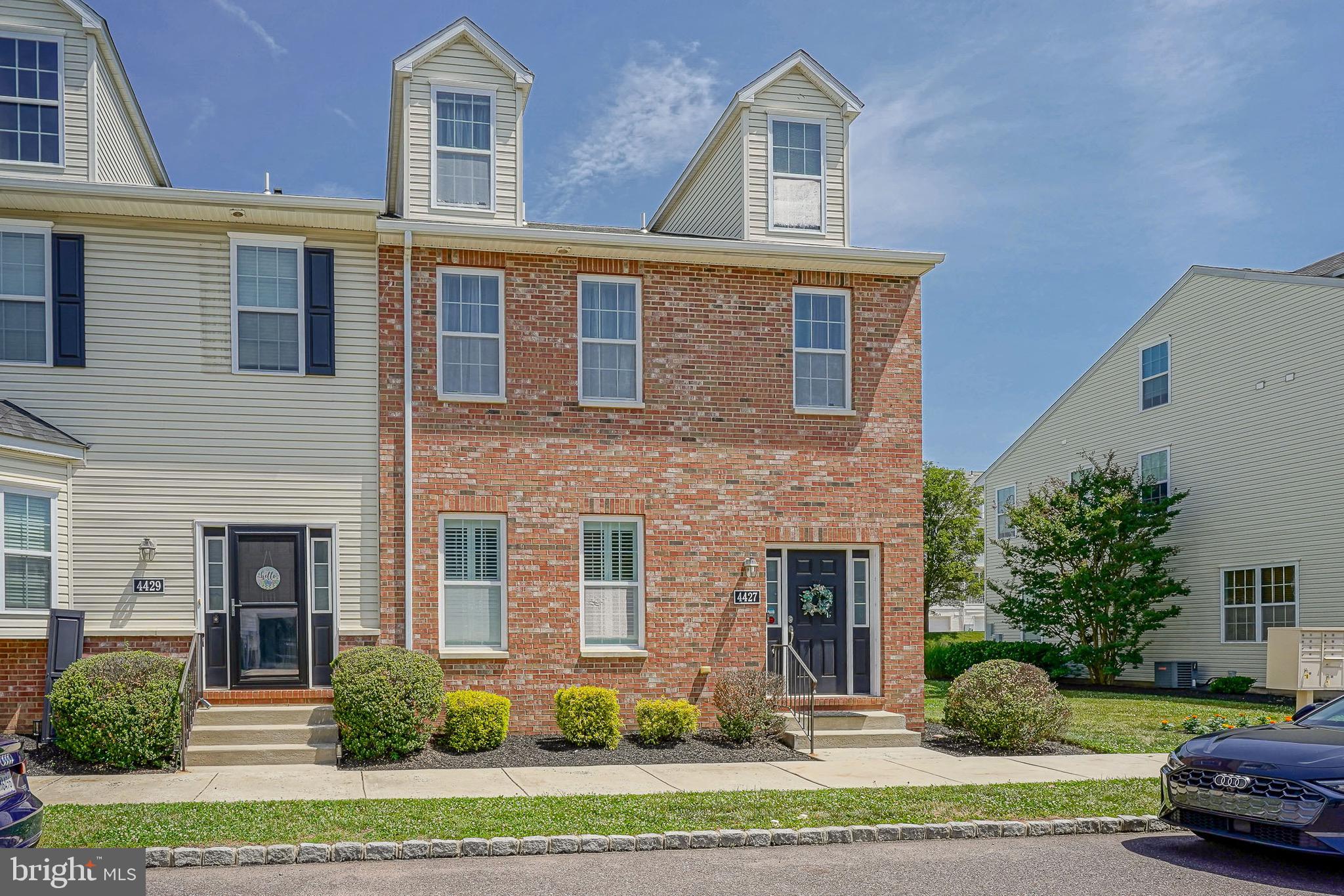Welcome to 4427 Riverview, #48, a stunning, turn-key Bainbridge end-unit townhome in the highly desirable Hilltop at Falls Ridge community. Enjoy the convenience of 2 car parking, with garage and driveway. Plus, low-maintenance HOA living covers your snow removal, lawn care, and all exterior maintenance. Great location, with close proximity to highway 76, Kelly Drive and Septa Regional Line to Center City. Enjoy activities outdoors with close proximity to Wissahickon Valley Park, Fairmount Park, Schuylkill River Trail. Walnut Lane Golf Club and more. Visit the wealth of restaurants in East Falls and Manayunk. Offering the perfect blend of suburban tranquility and urban accessibility, this immaculate 3-story, 3-bedroom, 3.5-bathroom condo-townhome is designed for effortless modern living. An airy, open-concept layout featuring rich hardwood floors, custom plantation shutters, a convenient powder room, and a warm, sophisticated vibe perfect for entertaining. Fully equipped with sleek granite countertops, 42-inch premium cabinetry, a deep double sink, and top-of-the-line stainless steel appliances. The adjacent dining area features oversized glass sliding doors that flood the main level with natural light and lead to your rear outdoor access. The second floor boasts a double-door primary Suite complete with a private sitting room, spacious walk-in closet, and a spa-like ensuite bath featuring a double vanity, soaking tub, and separate shower. Two additional generously-sized bedrooms, a large shared full bath, and a dedicated laundry closet round out the second level. The massive third-story family room/den includes its own full bathroom.  This floor is ideal for a media room, home office, or private guest suite.