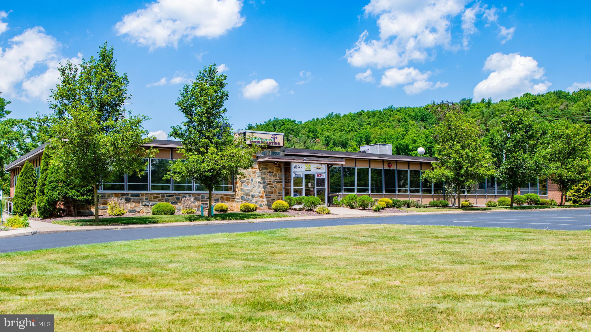 Positioned along one of Loyalsock Township's busiest commercial corridors, this exceptional office investment opportunity benefits from approximately 7,500 vehicles per day and convenient access to highways. The property consists of approximately 11,500sf of fully occupied office space, divided into three separate suites, and has off-street parking for up to 65 vehicles. The anchor tenant, a well-established local radio station, occupies 6,750 square feet. The current owner, who also owns the radio station, is willing to execute a long-term lease and remain in place. Alternatively, the owner is willing to vacate with adequate notice, creating a rare opportunity for an owner-user to acquire a turnkey headquarters in one of Lycoming County's most desirable commercial locations.