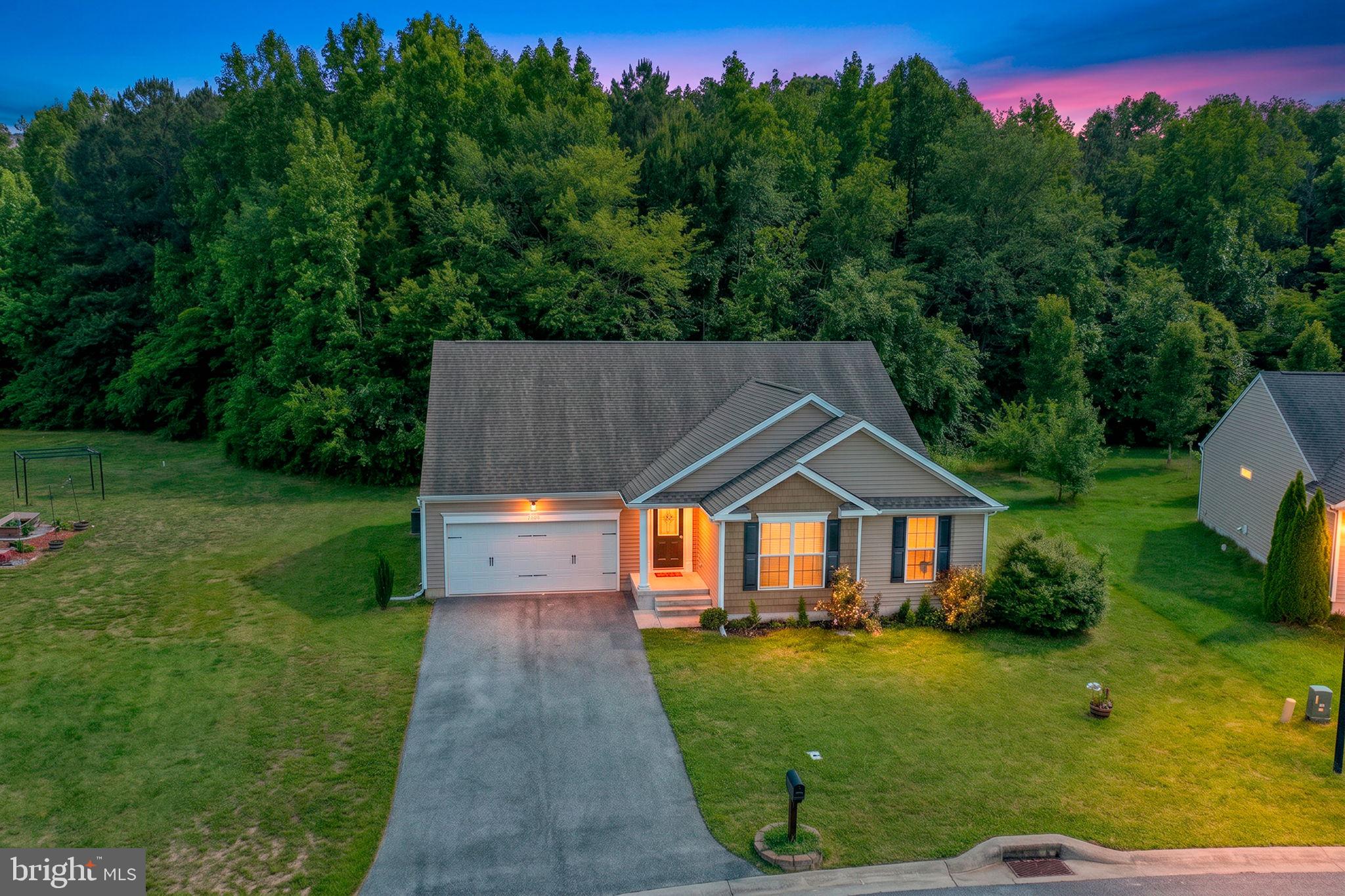 Welcome to this beautifully maintained ranch home in the sought-after Fox Hollow community. Offering 3 bedrooms, 2 full bathrooms, and approximately 1,853 square feet of living space, this home combines comfortable one-floor living with an open and inviting layout. The spacious great room features soaring ceilings and abundant natural light, flowing seamlessly into the kitchen and dining area—perfect for everyday living and entertaining.  The well-appointed kitchen boasts granite countertops, ample cabinetry, and a functional design that overlooks the main living space. The private primary suite offers a relaxing retreat with a spacious bedroom, walk-in closet, and en-suite bath, while two additional bedrooms provide  flexibility for family, guests, or a home office.  Step outside and enjoy one of this home's most desirable features—a premium lot looking at a serene pond, providing peaceful water views and a picturesque backdrop for morning coffee or evening relaxation. The backyard offers the perfect setting to unwind and enjoy nature right from your own patio.  Additional highlights include LVP flooring, main-floor laundry, an attached two-car garage, central air, and public utilities. Conveniently located near shopping, dining, Dover Air Force Base, and Delaware's beaches, this home offers the perfect combination of comfort, convenience, and scenic surroundings.