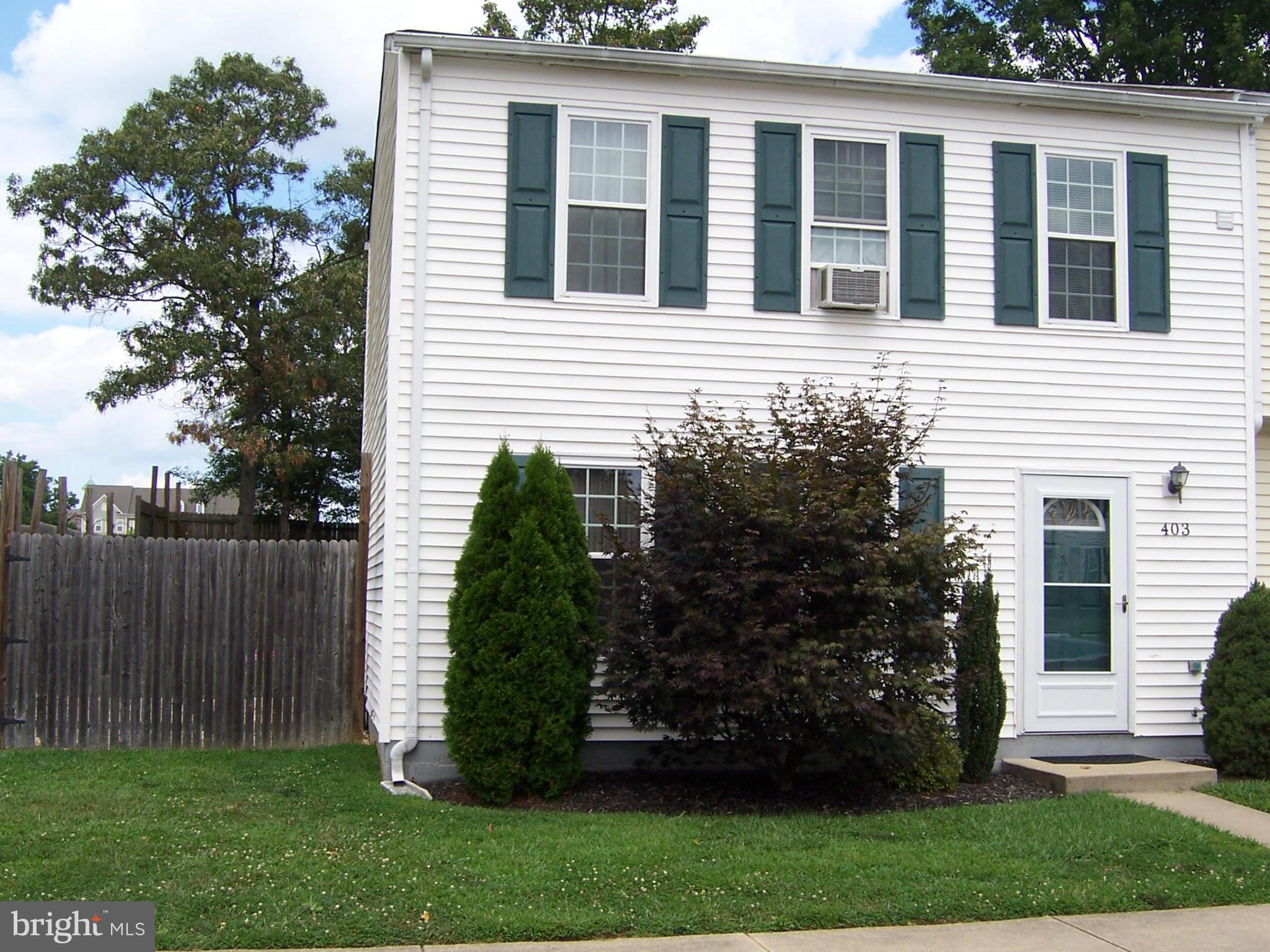 Great End Unit, 3 bedroom Home in heart of  LaPlata!  Play ground right next door.  Listen to the music festivals from  your beautifully landscaped and fenced backyard!  Two small sheds for your use. Patio with Grill for your use.  Two parking spaces. Freshly painted and ready for you.  Make your appointment to see this one today!