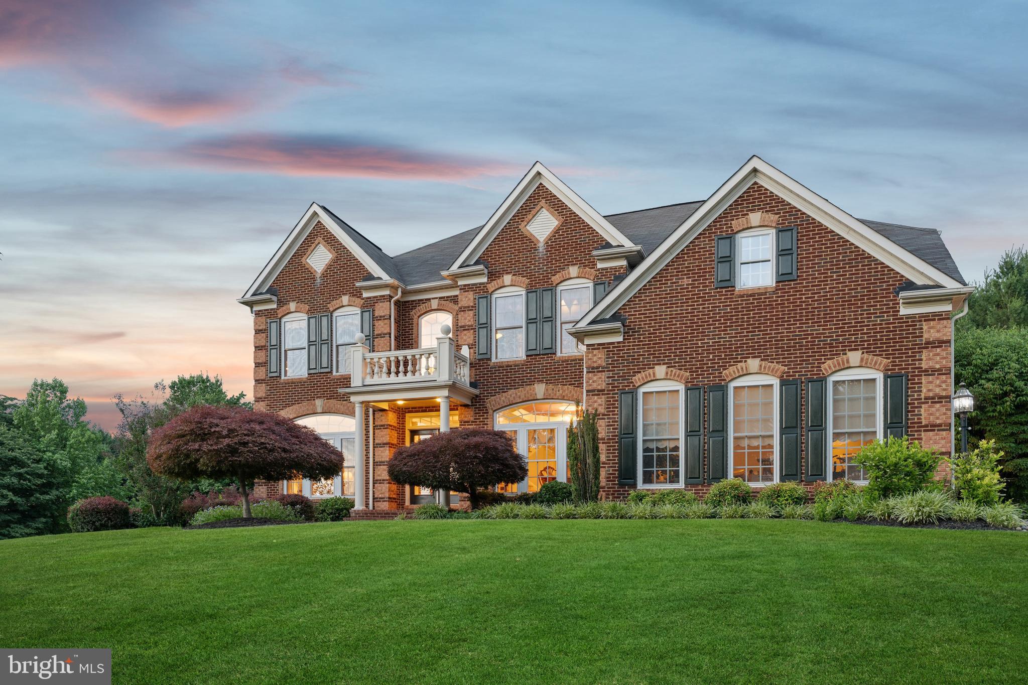 Positioned on a private cul-de-sac in the community of Phillips Field in the Hereford School District, 19307 Richroy Court offers a spacious single-family residence set on 1.14 acres. Built in 2003, this brick colonial presents a substantial layout with over 6,000 square feet of living space, and multiple areas designed for everyday comfort, entertaining, and flexible use.

A two-story foyer opens to an open floor plan featuring a dramatic two-story great room with gas fireplace and soaring windows, formal living and dining rooms, and a kitchen open to the breakfast area. A flex room / den on the main level also allows for the opportunity for a private home office, additional bedroom, and more.

Upstairs, the primary suite impresses with a tray ceiling, sitting area, and spa bath with soaking tub, separate shower, and dual-sink vanity; three additional bedrooms and two full baths complete the level. 

The expansive lower level offers flexible space for a rec room, gym, media room and more. Outside, enjoy a private oasis: an in-ground pool with cascading stone waterfalls, a spacious paver patio, and beautifully landscaped grounds — minutes to local necessities, shopping, and commuter routes. A rare mix of space, privacy, and comfortable living.
