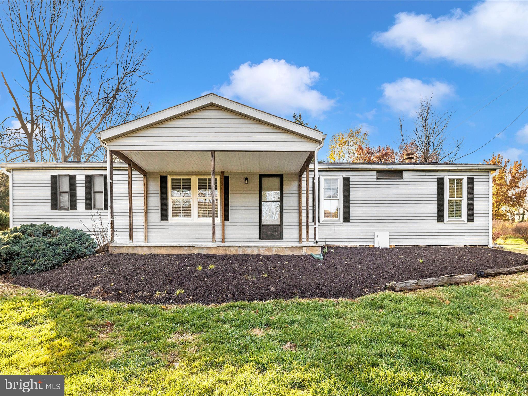 Welcome home to 27 Bluegill Dr! Nestled on 2.33 acres of unrestricted land, this charming 3-bedroom, 2-bath ranch-style manufactured home offers a perfect blend of tranquility and convenience, with seasonal river views providing a serene backdrop. Step into move-in-ready elegance where every detail has been carefully curated – from the brand-new luxury vinyl plank flooring and carpet to the crisp, top-to-bottom paint job. Modern comforts abound with a brand-new roof, ensuring long-term peace of mind. Effortless outdoor living awaits with a spacious two-car detached garage and an expansive lot, offering endless possibilities. Enjoy the prime location, minutes from the Appalachian Trail, C&O Canal, and easy access to commuter routes to Maryland, Virginia, and the DC metropolitan area. Don't miss the chance to make this haven your own – schedule a showing today and envision the lifestyle that awaits you at 27 Bluegill Dr.