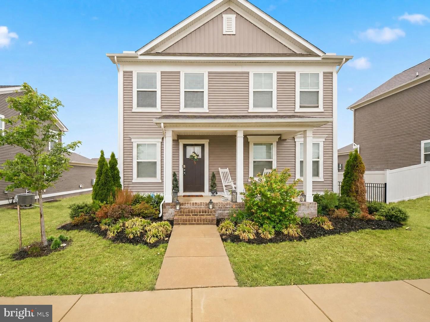 FORMER MODEL HOME WITH FINISHED BASEMENT REC ROOM! Welcome to 17912 Meriwether Lewis Street in the highly desirable Ladysmith Village community of Ruther Glen, VA—ideally positioned between Fredericksburg and Richmond for an easy north or south commute. This beautifully maintained 4-bedroom, 2.5-bath colonial with a full basement was the former model home, showcasing  thoughtful design throughout. Built in 2021, it features an open-concept main level with upgraded flooring, a spacious great room that flows effortlessly into the dining area and stunning kitchen complete with Aristokraft cabinetry, granite countertops with eased edge, stainless steel Whirlpool appliances,  double-basin stainless sink, Moen fixtures, USB outlet, and a large bar-style island perfect for entertaining. 
Upstairs, the spacious primary suite offers an oversized walk-in closet and private bath with cultured marble vanity tops and comfort-height elongated commodes, while three additional bedrooms provide flexibility for guests, hobbies, or a home office. 
The partially finished basement includes a generous recreation room, unfinished storage area, and a full bath rough-in for future expansion. Additional highlights include an  irrigation system, two-car rear garage, vinyl insulated Low-E windows, Carrier 14 SEER HVAC system, 50-gallon water heater, whole-house blinds, and the Home Is Connected® Smart Home package featuring video doorbell, smart thermostat, smart lock, and touchscreen control panel. 
Enjoy resort-style living with access to a 10,000 sq. ft. clubhouse, fitness center, pool, parks, playgrounds, trails, amphitheater, dog park, community garden, and public library—all within the vibrant Ladysmith Village community. Move-in ready and packed with value, this former model home offers comfort, convenience, and lifestyle. Welcome Home!