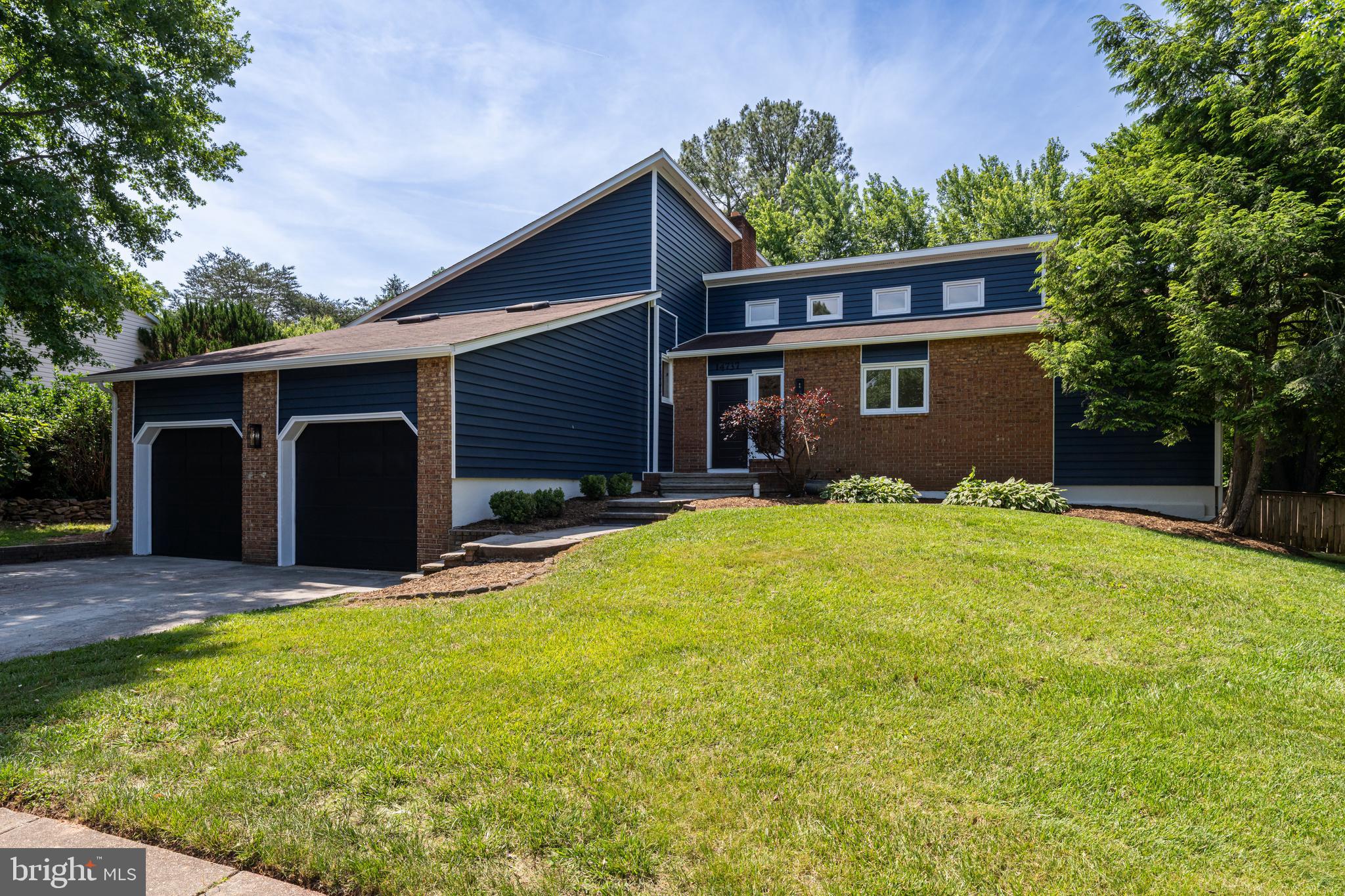 Welcome to this beautifully upgraded custom-built home in Centreville, offering close to 3,000 square feet of thoughtfully designed living space on a spacious 0.24-acre lot. From the moment you enter, you are greeted by tall ceilings, an abundance of windows, and impressive natural light throughout the home.

The property has been upgraded from top to bottom, featuring luxury vinyl plank wood flooring, fresh paint, new kitchen appliances, quartz countertops, and modern finishes throughout.

Upon entering, you are welcomed into a large living room and dining room area, separated by a charming step-up design that creates a unique and open flow. The living room is filled with natural sunlight, highlighted by large windows and ceiling windows that add character and warmth to the space. The updated kitchen features new appliances, quartz countertops, ample cabinetry, and a clean modern look. The dining room provides access to the sliding patio door, which opens to a spacious deck overlooking the large fenced-in backyard, perfect for entertaining, relaxing, and enjoying outdoor privacy.

The upper level features three bedrooms and two full bathrooms. The primary bedroom offers generous space, great natural light, ample closet space, and a large private bathroom. The secondary bedrooms feature a very unique layout with loft-like spaces, ideal for an additional sitting area, office, study space, or creative use. An additional full bathroom conveniently separates the secondary bedrooms.

The lower level provides even more functional living space, featuring a recreational area, a sliding door with walkout access to the backyard, an additional bedroom, and interior access to the two-car garage. The home also includes an underground level with another bedroom, a washer and dryer area, storage space, utility room, and a private door leading to a staircase that brings you back up to the deck level.

With its custom-built character, spacious layout, major upgrades, fenced-in backyard, large deck, and close proximity to shopping, dining, commuter routes, and everyday necessities, this Centreville home offers the perfect combination of comfort, style, and convenience.
