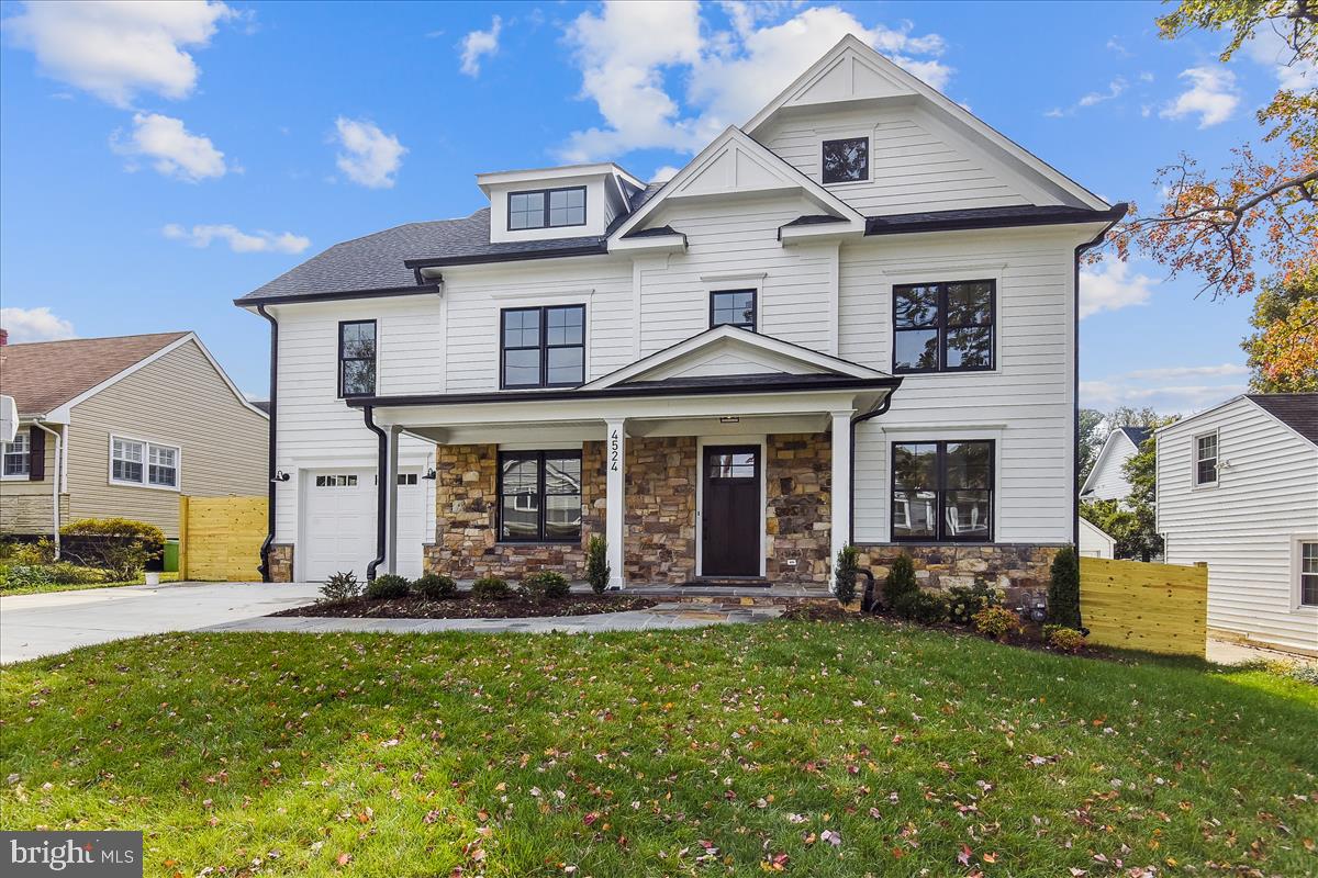 Amazing new Modern Farmhouse in the lovely Glenbrook Village subdivision built by Spring Valley Builders LLC. 6 bedrooms, 5.5 baths, extensive custom molding and trim package and amazing upgrades and finishes. Chef’s Kitchen with gas range and hood, wall oven, built-in Advantium microwave/oven, 48” refrigerator, dishwasher, Farmhouse sink, marble tile backsplash, quartz countertops, center island with beverage center and generous sized breakfast area. Sun-filled family room with 4 glass doors, coffered ceiling, gas fireplace with shiplap and mud room with built-ins. Formal dining room with beautiful wainscoting, private living room/office with glass pocket doors and covered flagstone porch. Upper level I features the owner's suite with a huge walk-in closet, breakfast bar with mini refrigerator and a gorgeous luxury marble owner's bath with jetted tub and separate oversized glass enclosed shower with bench and dual shower heads. 3 additional bedrooms with 2 additional full baths, and large laundry room. Upper Level II with bedroom, full bath and Family/Homework-Study area. Finished lower level with life proof vinyl flooring includes 6th bedroom, full bath, recreation room, exercise room and storage/utility room.  White Oak Hardwood floors on main and upper levels, recessed lighting and garage. This home is close metro, shopping, restaurants and parks, the beltway and I-270 Easy access to Downtown Bethesda and more. Part of the Bethesda-Chevy Chase High School Cluster.