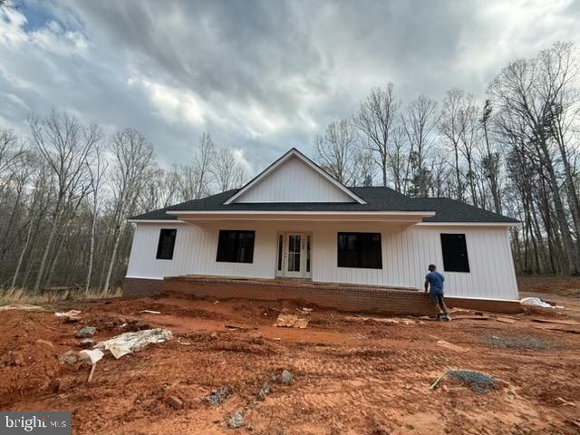 Builders and investors — this is a fantastic opportunity to complete and customize a home already well underway. Situated on 4 beautiful acres in a highly desirable location near the Town of Louisa and convenient to Interstate 64, this 3-bedroom home features completed exterior work including architectural shingles, vinyl siding, a finished front porch, and a new well with pump already installed. The interior is ready for your vision and finishing touches, with drywall, plumbing, electrical, septic system, and interior completion still needed. All inspections have been completed and a 3-bedroom perc test has already been approved. Whether you’re looking for your next investment project or the chance to create your dream home, the possibilities here are endless. OWNER IS MOTIVATED!!