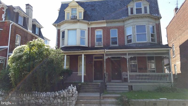 Investor Alert!  Spacious, all brick semi-detached, 2 unit.  Fully rented.  1st floor unit, 2 bedrooms, 1 bath with sun room, pocket doors and high ceilings.  2nd floor unit 2-3 bedrooms, 1 bath, hardwood floors thru out, ceramic floor in bathroom, balcony off kitchen.  Gas and electric separate.  Fire escape, washer & dryer hook up.