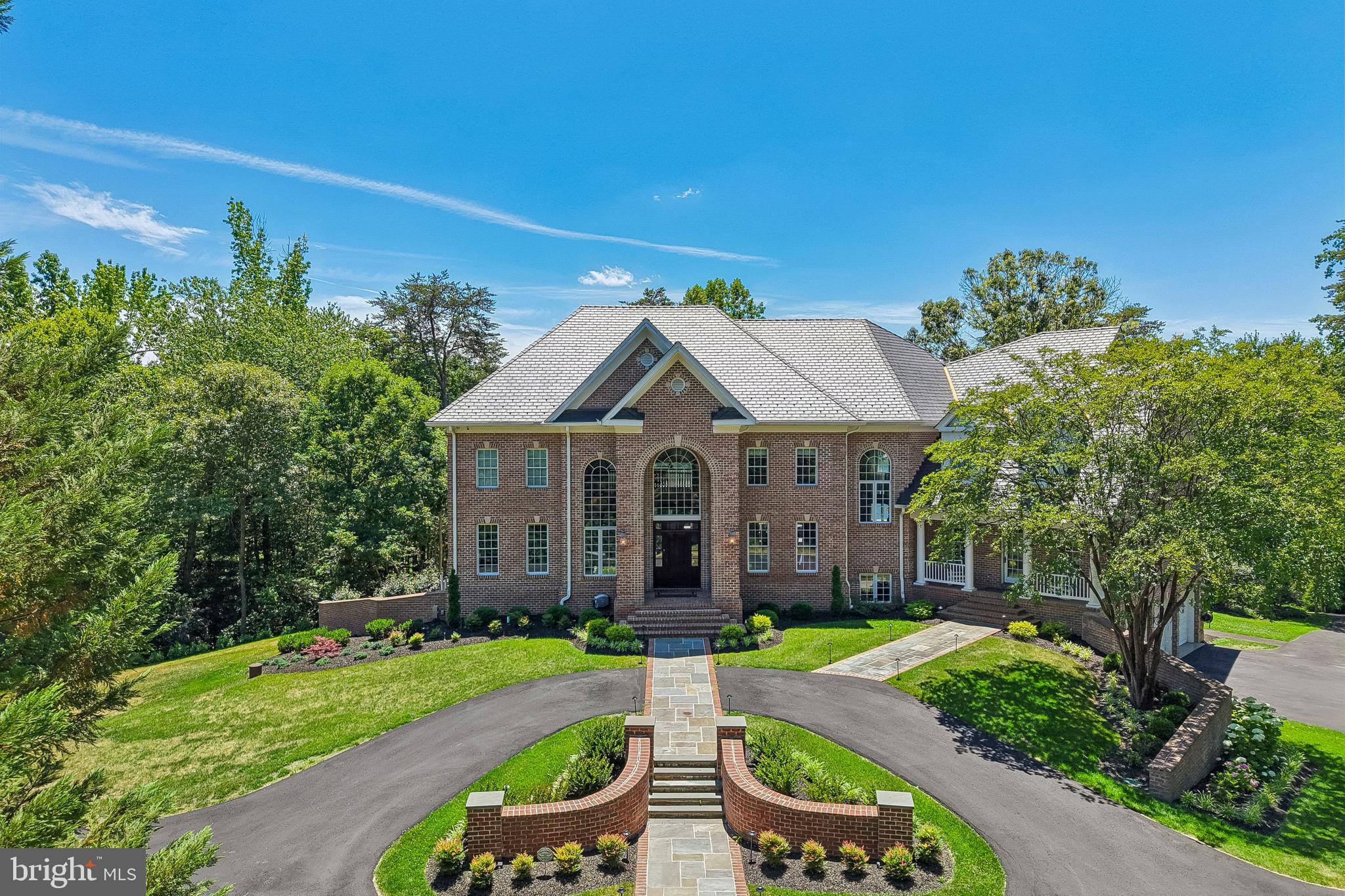 Introducing a masterfully curated waterfront estate that redefines luxury living on the shores of Severna Park. Tucked away within the prestigious, gated community of Bluff Point on the Severn, this magnificent residence offers the ultimate blend of privacy, sophistication, and resort-style amenities. From the grand roundabout driveway that welcomes your arrival to the sweeping, panoramic water vistas framing the rear of the property, every detail has been designed to deliver an uncompromising coastal lifestyle.
The Ultimate Waterfront Paradise- The crown jewel of this estate is its seamless, private connection to the water. A beautifully paved path provides effortless access from the home straight down to the shoreline, where your private paradise awaits. Spend your mornings relaxing on your private sandy beach, or step onto the expansive private dock, fully equipped with a heavy-duty boat lift and two Jet Ski lifts offering immediate entry to the region's finest boating and watersports.
Resort-Style Outdoor Living- Designed for outdoor entertaining or relaxing, the estate boasts a striking multi-tiered waterfront deck that overlooks a private oasis. At the center of the outdoor experience is a pristine, heated pool equipped with an automated safety cover, hot tub, and a private basketball court—perfect for active afternoons before cooling off in the water.
An Entertainer’s Dream & Lower-Level Retreat- Inside, the home’s grand proportions are stitched together by a built-in, multi-zone sound system that flows seamlessly through the main living areas and outdoor decks. This residence features a private elevator providing convenient access across all three expansive levels.
The exceptional walkout basement serves as a secondary entertainment hub, designed to mirror the luxury of the main floors. The lower level features a fully equipped second kitchen and custom bar, making it the ultimate venue for hosting formal events, game days, or intimate evenings by the water.
Turn-Key Excellence Beyond its breathtaking aesthetic and leisure features, the estate has been meticulously maintained with premium structural updates, including a new synthetic slate roof installed in 2022, offering the timeless elegance of classic slate with modern, high-durability performance.