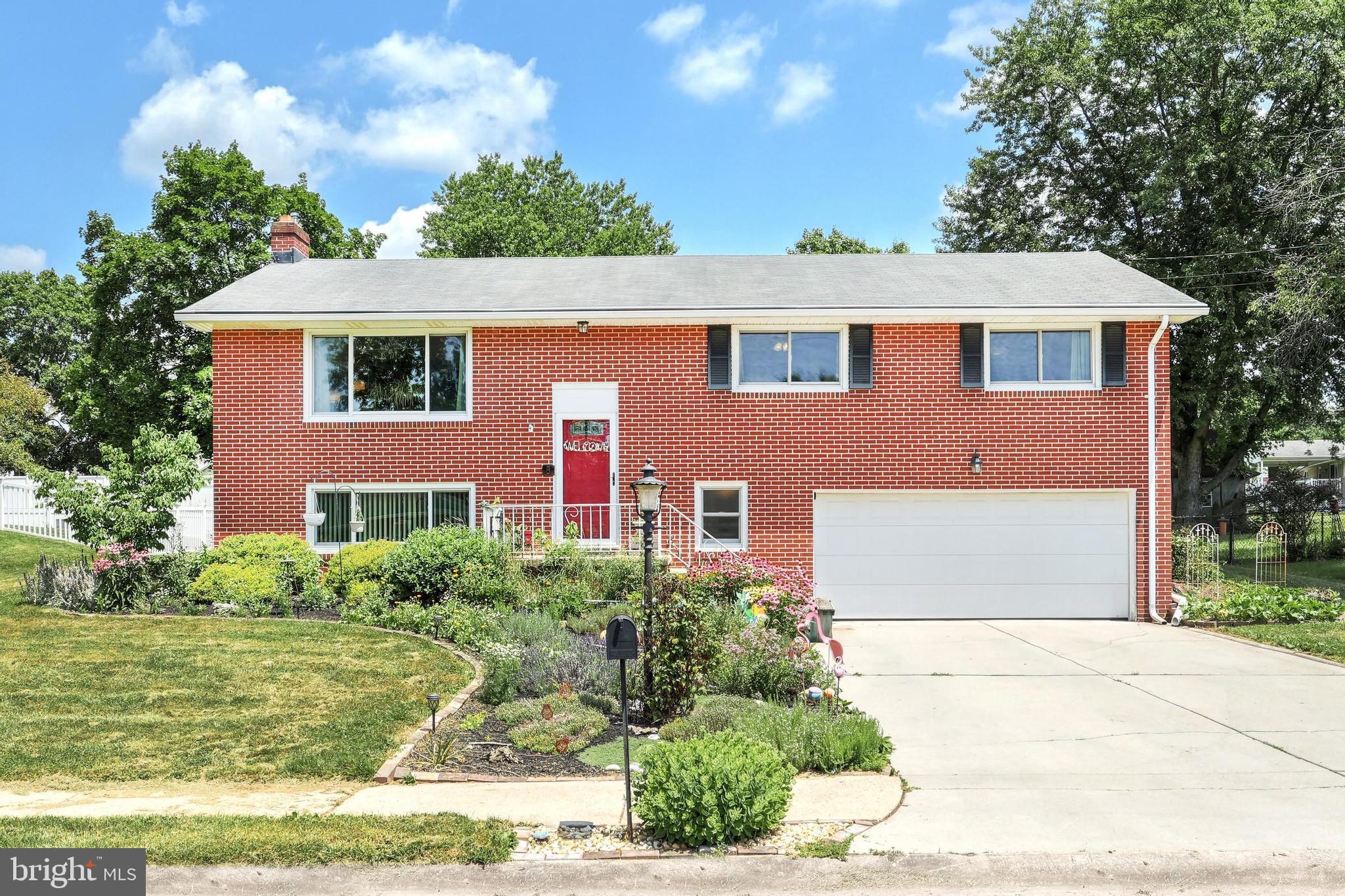 Driving up to this property you will feel right at home in a beautiful neighborhood. Pull right into the paved driveway and you see an attached garage and a rustic railing that leads to a quant foyer. Walk up the stairs and you walk into the homely living room that gives great views of the sunset out of the houses new windows. From there you can walk into the traditional kitchen that is also open to the dining room. Access to the three bedrooms and back patio is available here. the back deck looks over the level green back yard. Downstairs another play room and bathroom is not far from the garage. You don't want to miss out on this great house!
