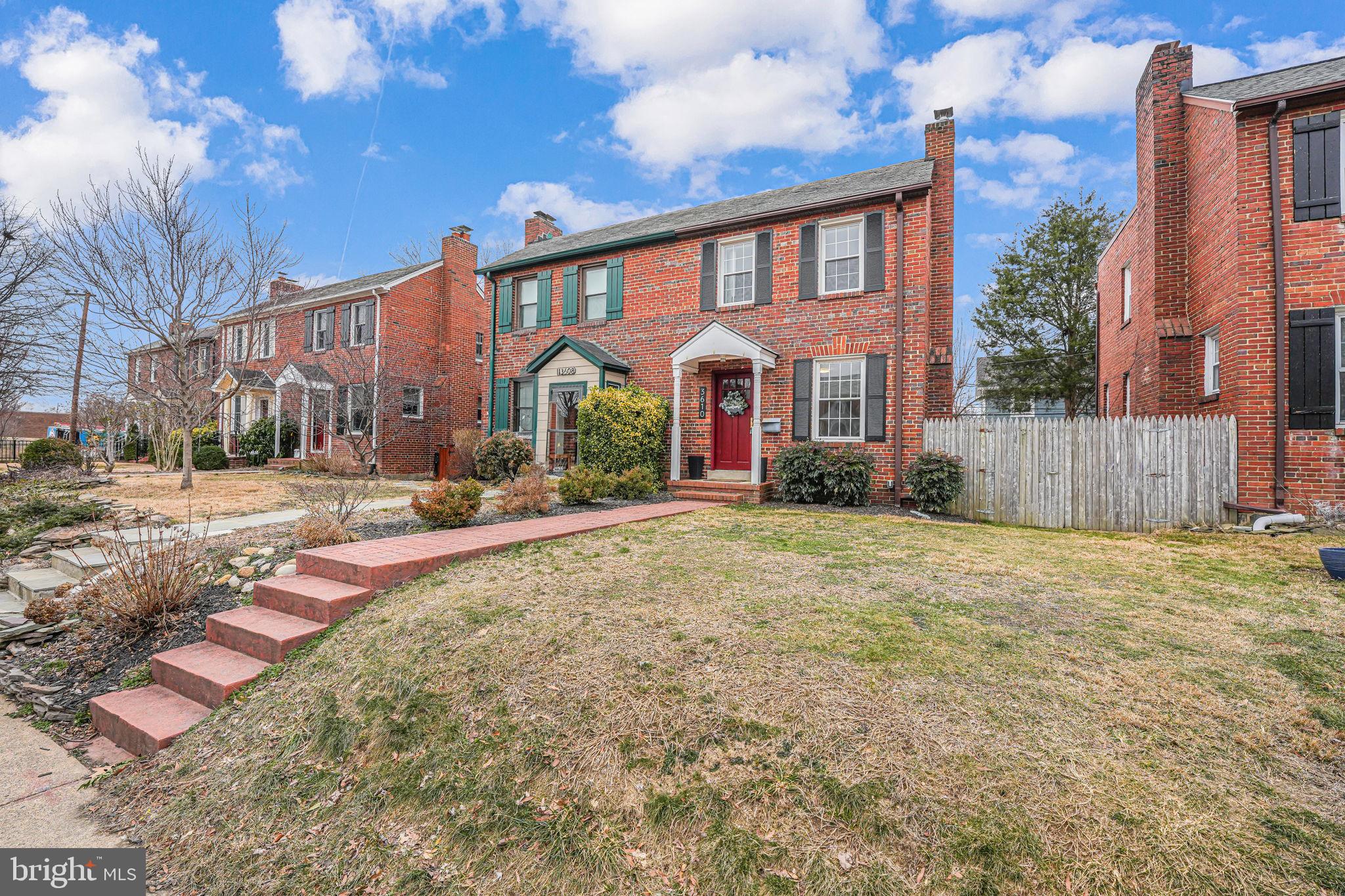 Move-in ready charmer in sought-after Glebe Manor/Arlington Heights!  Rarely available duplex with NO HOA and a full front, side, and rear yard.  Spacious room sizes offer nearly 1,100 square feet of finished space across the top two levels plus the addition of an enclosed rear sunroom, a perfect three-seasons bonus space.  Primary bedroom easily fits a King bed and features a walk-in closet, while the secondary bedroom space easily fits a Queen bed with room to spare.  Updates include newly refinished solid plank Oak hardwood flooring (2025), fresh paint throughout (2025), exterior AC compressor (2021),  updated Quartz countertops, stainless steel appliances (gas cooking!), an updated bath vanity, newly refinished tub, young water heater, young double pane vinyl windows, new utility sink, and a full waterproofing system.  The unfinished basement with connecting stairs AND a rear walk-up stairway is perfect for storage or a home gym while offering the opportunity to fully finish in the future (generous ceiling height!).  A FULL perimeter waterproofing system complete with sump pump and stairwell drain offers a lifetime warranty transferrable to the new owner (installed 2024,  $10,000).  In addition to the numerous quantifiable upgrades, this classic 1938 home is filled with the intangible cozy charm of yesteryear.  An unusually large number of windows wrap three sides of this solid brick structure and endless natural light pours in.  Tucked just South of Rt 50, this central Arlington location could not be more ideal:  1 mile North to Ballston, .8 miles South to Columbia Pike, .1 mile to Route 50, 3.5 miles East to Washington, DC, 4.5 miles to Reagan National Airport, and the list continues while numerous local attractions like Ruthie's All Day and Arlington Cinema and Drafthouse allow you to forgo transportation altogether.  Street parking is readily available and permits are issued by Arlington County.  Don't miss your chance!