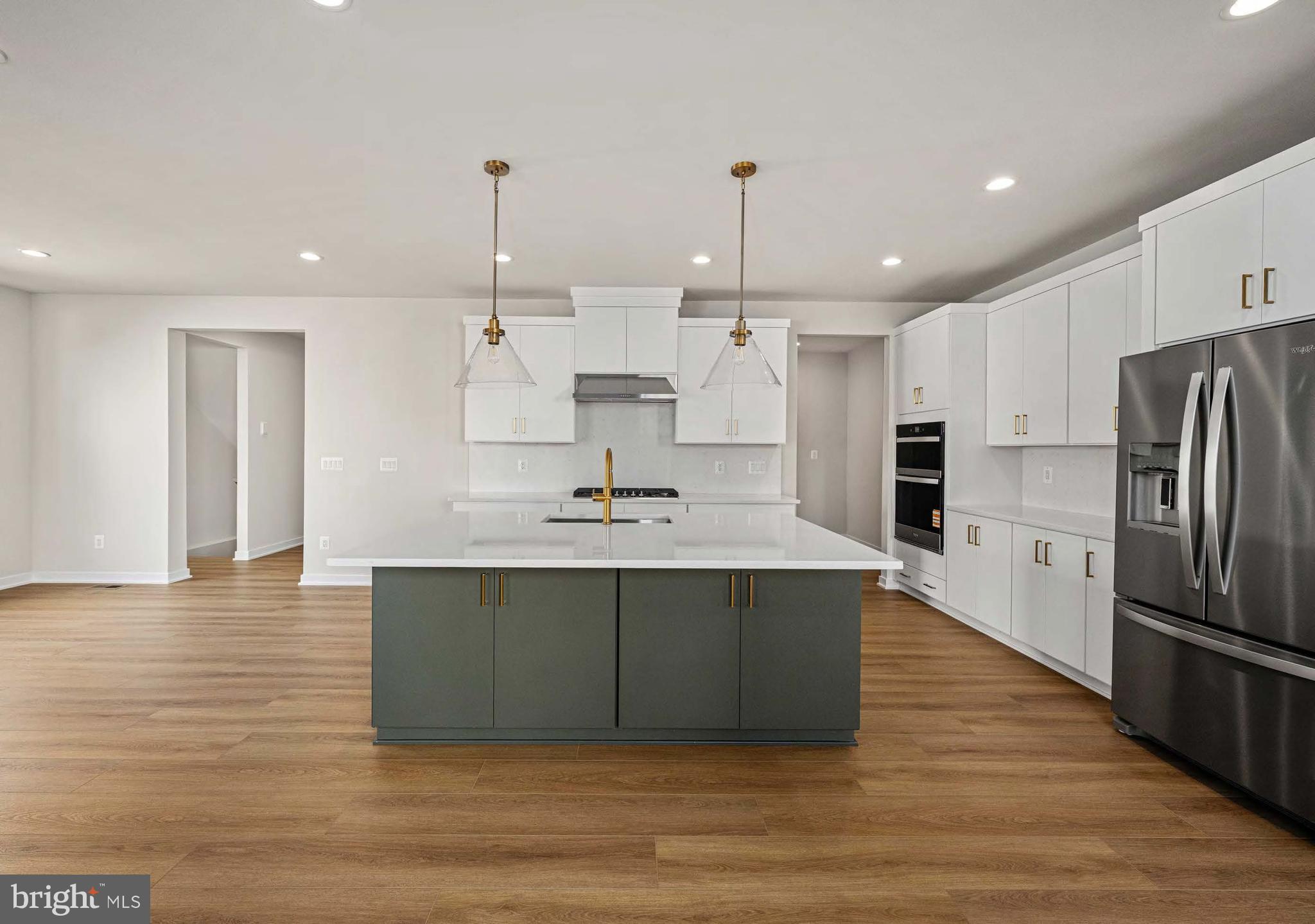 The Gifford home design blends comfort and luxury across three beautifully designed levels plus a daylight, partially finished basement. The main level features a sophisticated open-concept layout with a welcoming foyer that flows into a spacious great room, casual dining area, and a gourmet kitchen complete with a center island, breakfast bar, and walk-in pantry.
Upstairs, the primary suite offers a peaceful retreat with a spacious walk-in closet and a spa-inspired bath featuring a dual-sink vanity, a luxurious shower, and a private water closet. Three additional bedrooms provide ample space, including one with its own private bath and two that share a full hall bath. Multiple walk-in closets are found throughout the home, offering abundant storage.
The daylight basement adds valuable living space, including an additional bedroom suite and a wet bar rough-in perfect for entertaining or extended stays along with plenty of storage. Additional highlights include a two-car garage, convenient everyday entry, and a powder room for guests.