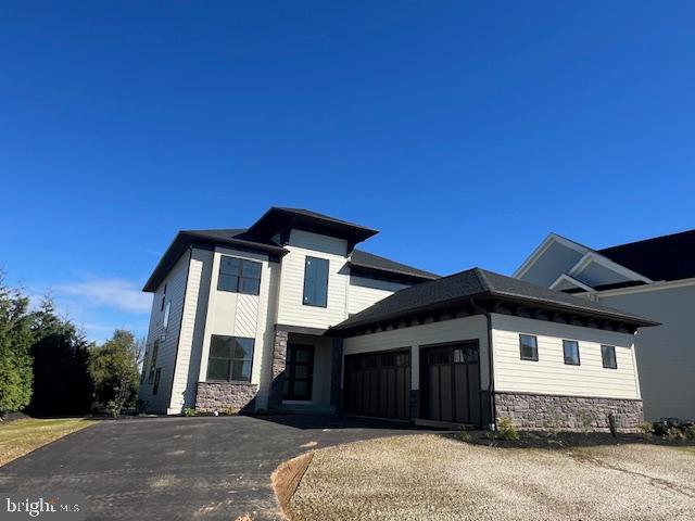OPEN HOUSE SATURDAY 1:00-2:30*Two MODEL HOMES*Stunning 3560 SF Two Story near completion features 1226 SF Finished Daylight Lower Level Office or 5th Bedroom, Family Room, Full Bath *Open Floor Plan with Flair*10’ Ceiling Height, Coffered Ceiling, Crown Molding & Hardwood Floor First Floor*First Floor Bar/Built in Cabinets-Beverage Refrigerator*First Floor Den/Office with French Doors*Open Staircase*Custom Kitchen complete with SS Appliances, Granite counters, Tile Backsplash, 5 Burner Gas Stove, Walk-in Pantry, Center-Island/Breakfast Bar*Computer Room*Owner's Suite: Luxurious Bath & Walk In Closet*4 Bedrooms-4.5 Bathrooms*Spacious Covered Patio with Built-in Grille, Beverage Refrigerator, Granite Countertops* Stone/Hardi-Plank Exterior*3 Car Side Entry Garage Plus Storage Bay*3 Acre Neighborhood Park-Pavilion-Playground-Walking Trails*Quality Built by Costello Builders