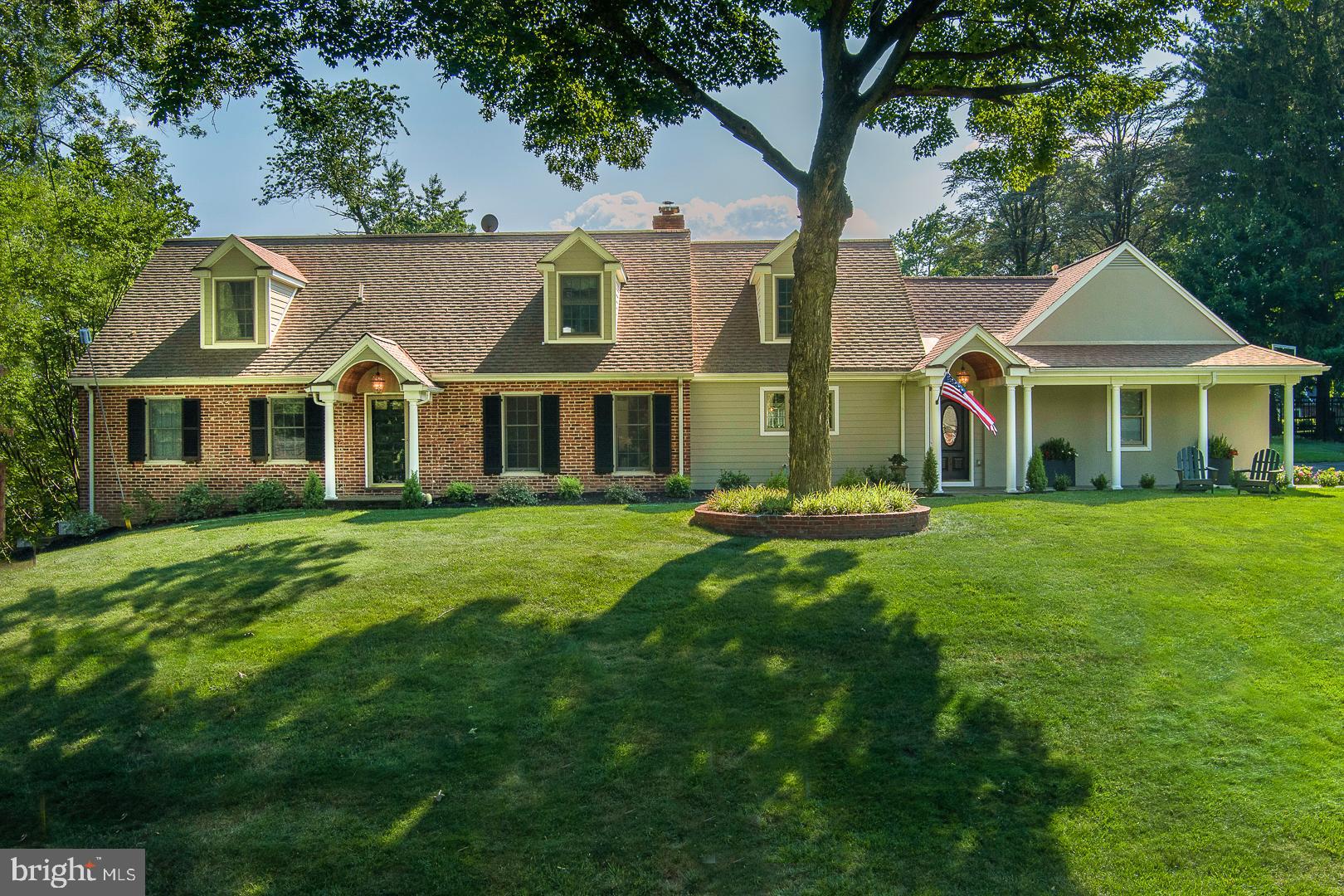 The moment you step into 542 Tory Hill Rd, you'll be captivated by the beautifully updated Kitchen that effortlessly transitions into the stunning Family Room. The updated gray and white marble bathrooms, abundant natural light, spacious rooms, and flat backyard all contribute to the home's tremendous appeal. Located in the highly desirable Shand Tract neighborhood, known for its vibrant community spirit and array of activities, this expanded and updated Cape, with 4 bedrooms and 2.2 baths and approximately 3800 square feet of living space, sits elegantly elevated from the street. You'll immediately know this is the house for you.
Upon entering this lovely home, you'll discover more space than you ever imagined. The beautifully updated Kitchen features stunning quartz countertops, a subway tile backsplash, and modern lighting. The large Breakfast area includes a cozy fireplace and seamlessly flows into the expansive Family Room, which boasts large windows, built-in bookcases, wood beams, and dormer windows that flood the space with natural light. A glass French door opens to the flagstone Patio, perfect for effortless entertaining and enjoyment.
Adjacent to the Kitchen, you'll find a spacious Dining Room and Living Room that offer beautiful views of the Patio and backyard, enhanced by mature plantings for added privacy. The first-floor Primary Bedroom Suite, newly renovated in 2022, features a large walk-in closet, an en-suite Bathroom with stunning gray and white marble floors and countertops, double sinks, and an oversized frameless shower. The Home Office, which can serve as a fourth Bedroom, is conveniently located nearby.  Completing the first floor is a large Mudroom/Laundry Room with direct access to the attached 2-Car Garage along with a Powder Room. The layout allows you to walk from the garage to the Primary Bedroom without encountering any steps.
Upstairs on the second floor, you'll find two oversized Bedrooms, an updated Bathroom with elegant gray and white marble tiling, an oversized hall closet, and a spacious walk-in Attic that could easily be converted into a fifth Bedroom. 
The expansive finished lower level serves perfectly as a Media/Playroom/Workout Area, featuring three full-size windows that offer abundant natural light. It includes a door leading to the back and side yards, a convenient Half Bath, and a sizable unfinished Storage Area.
The home resides within the Tredyffrin-Easttown School District, celebrated for its top-ranked public schools, ensuring an exceptional educational experience. Conveniently located close to major commuter routes, shopping destinations, and dining establishments, including downtown Wayne, Gateway Shopping Center, Whole Foods and Wegmans, the Devon Horse Show, and Septa Regional Rail. Take the opportunity to make this wonderful home yours and join one of Devon's most desirable neighborhoods.