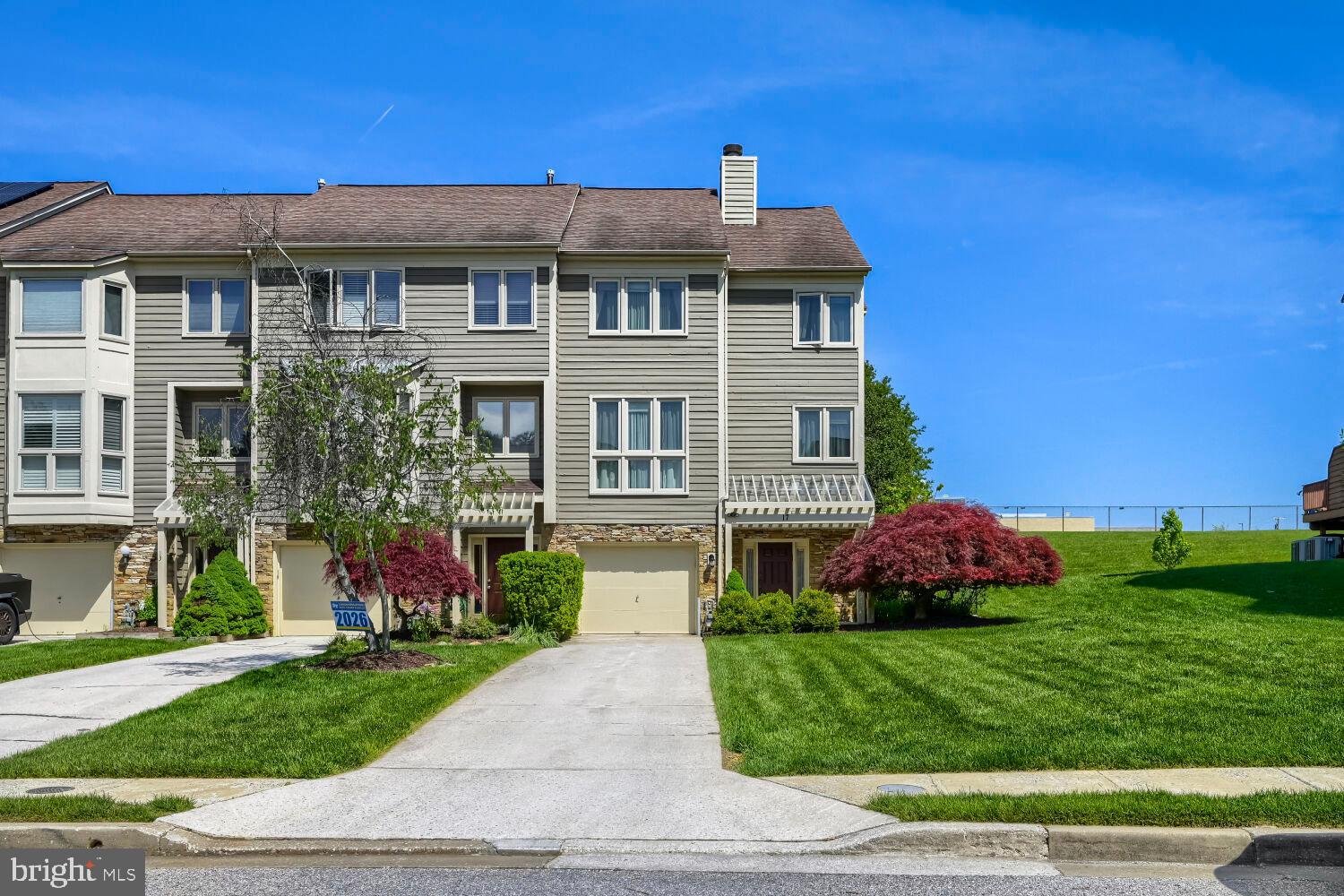 Perfectly renovated and meticulously maintained end-of-group townhome in highly desirable Summit Chase. This is the largest model in the community, offering over 2,500 sq. ft. of beautifully finished living space.

The updated kitchen features 42" cabinetry, granite countertops, stainless steel appliances, and pull‑out shelves in all base cabinets. A spacious breakfast area opens directly to the maintenance‑free deck, providing a serene outdoor retreat.

The bright, airy living room includes a wood‑burning fireplace, 9' ceilings, and elegant crown molding. Upstairs, you’ll find three generously sized bedrooms, all with cathedral ceilings. The luxurious ensuite bedroom boasts an expansive ceramic‑tiled bathroom with a large jacuzzi tub and separate shower.

A versatile main‑level family room—located next to a half bath—can easily be converted into an additional bedroom if desired.
All windows on Upper 1 level and windows in two bedrooms on Upper 2 level are replaced.
Major exterior items are fully handled by the HOA, including roof, siding, lawn care, snow removal, and more. The home’s exterior was painted by the HOA in April 2026, and roof replacement is scheduled for next year, offering peace of mind for years to come.

This is a rare opportunity to own a spacious, turnkey home in a sought‑after community with exceptional amenities and low‑maintenance living.
