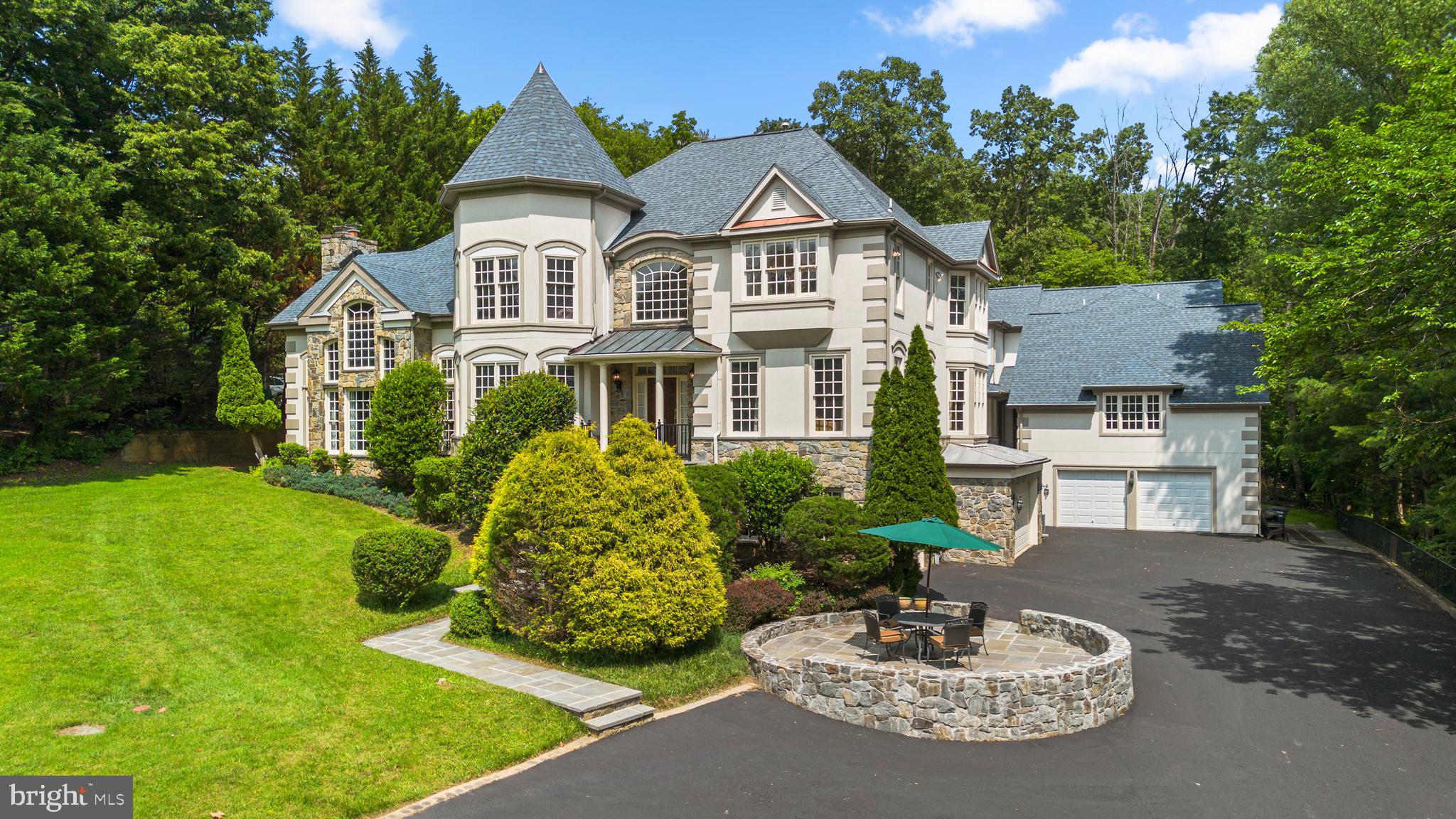 Nestled on 1.5 acres in the exclusive Glen Hills community, this extraordinary custom-built estate seamlessly blends Chateau-style elegance with modern luxury. The stony exterior, steeply pitched roofs, and ornate details evoke timeless European charm. The main residence offers over 6,000 sq ft of finished living space, while a separate 2,500 sq ft guest house—fully updated and equipped—adds exceptional versatility. Both homes include two-car garages and share an expansive driveway.

Inside the main home, a soaring foyer leads to regal living spaces, including a grand family room ideal for entertaining, and spacious primary suites with spa-inspired baths. The walk-out lower level provides ample room for gatherings, while front and rear stone patios offer serene outdoor living.


Meticulously maintained with over $530K in recent upgrades, this property was professionally appraised in May 2025. Just minutes from top-rated schools, Lakewood Country Club, and Glen Hills Park, with easy access to I-270 and ICC-200. This is a rare opportunity to own a private, luxurious retreat in one of the area’s most sought-after neighborhoods