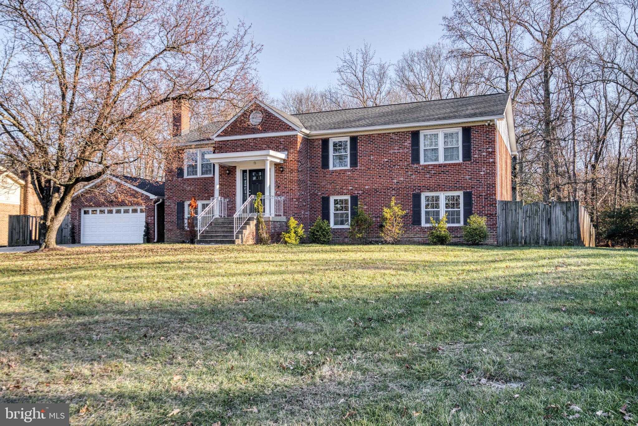 PLEASE CALL LISTING AGENT FOR SHOWING INSTRUCTIONS 240/461-2383.            PRICE REDUCED!!!!!!Fall in love with this beautiful home , featuring 5 bedrooms and 3 full   baths, all new appliances and mechanical systems which were recently replaced. The master bathroom features marble floors  with a huge soaking tub and a frameless shower. There are lots of  closet space throughout. The beautiful kitchen features  granite countertops, upgraded cabinets, coffee bar, and eat- in space area. Step out to a  large deck which overlooks an enormous .50 acres fenced- in back yard. The lower level features  a large family room with  a brick fireplace,  2 bedrooms and full bath. Large two car garage with lots of extra space and is  connected by breezeway. This home is located in the beautiful neighborhood of North Tantallon, conveniently located  near National Harbor, National Golf and Country Club, Fort Washington Park, Short commute to DC and VA.