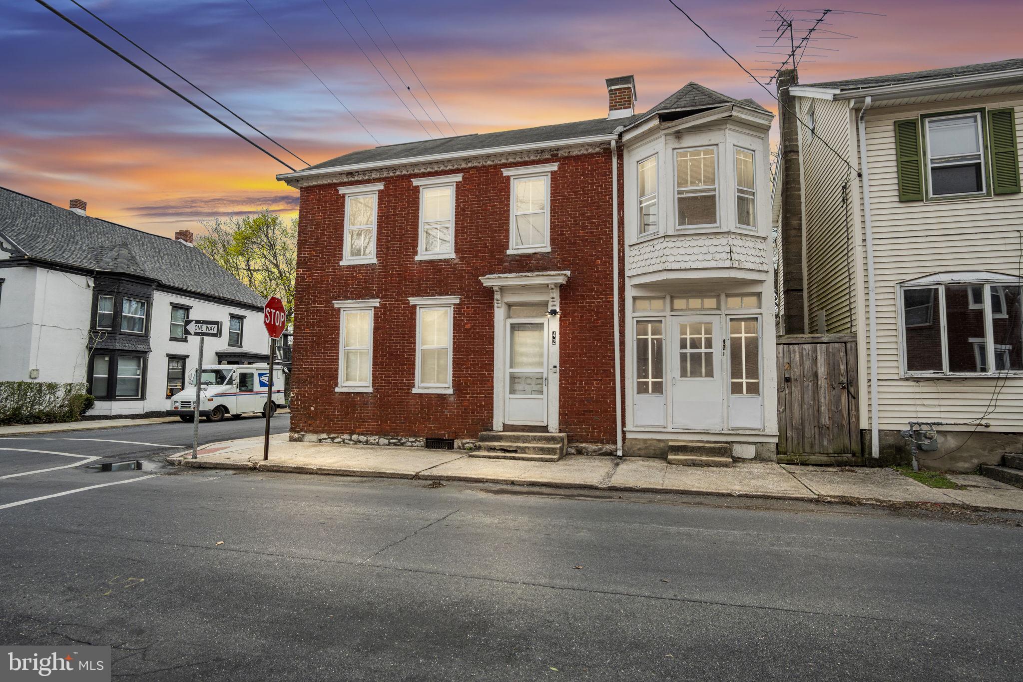 Welcome to this well-maintained 3-unit property located in the heart of the Historic District of Mechanicsburg, perfectly situated on a desirable corner lot. This investment opportunity is within walking distance of an array of amenities, making it an ideal choice for both residents and investors.  This property features three units, each offering its own unique charm. The first-floor front unit boasts a cozy one-bedroom layout, perfect for singles or couples looking for a charming living space. In addition, the first-floor rear unit presents another inviting one-bedroom option, providing a comfortable and convenient lifestyle. On the second floor, you’ll find a spacious three-bedroom unit, ideal for families or individuals in need of extra space. Together, these units create a versatile living environment suitable for a variety of tenants.  Two of the units are currently on month-to-month leases, providing flexibility for potential buyers or investors looking to establish long-term tenants or occupy the property themselves.  The property boasts ample off-street parking, with a designated parking area located at the rear for added convenience.  Don’t miss this opportunity to own a well-maintained multi-family residence in the heart of Mechanicsburg.   Schedule your viewing today!