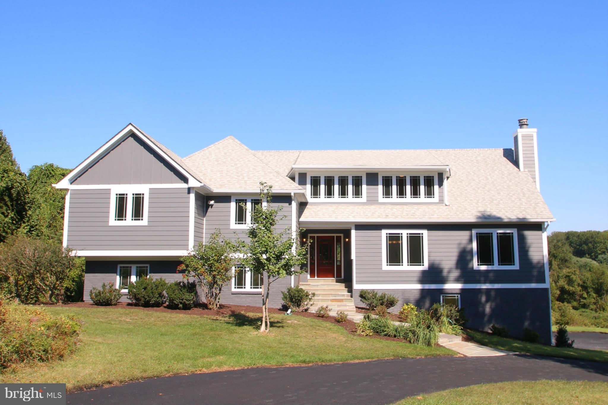 Stunning, Totally Renovated 6BR/4.5Bath Open Floor Plan, Light-Filled Home with Gorgeous Views! Eat-in Kitchen w/Granite &High End Appl.s, Spacious Luxury MasterSuite, Generous Living/Dining Spaces, 2Stone Fireplaces, New HardiePlank Siding,  Windows, Doors & HVAC, Fully-Fin WalkOut Basement with Kitchen & 2nd MB. Private-Multiple Trex Decks, 2Car Gar, Quiet Neighborhood, TopRatedSchools  SEE NOW!