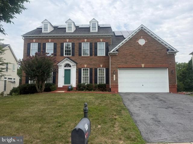 Welcome to this beautifully updated Colonial nestled on a cul-de-sac, offering the perfect blend of elegance, comfort, and energy efficiency. This spacious home features 6 bedrooms, 4.5 bathrooms , and two-car- garage with a newly finished epoxy floor. Step inside to discover newly LVP flooring throughout the main and upper levels, complemented by fresh paint throughout the entire home. Dual staircases provide convenient access from both the foyer and the gourmet kitchen, which is designed for entertaining with a large center island and open to a generously sized private deck overlooking a peaceful wooded setting. The fully finished walk-out lower level leads to a patio and offers exceptional space for entertaining , recreation, or multi-generational living. Ideally located one mile from Laurel Lakes, shopping centers, and I-95, and only half mile from the University of Maryland Laurel Medical Center, this home combines convenience with a tranquil setting. As an added bonus, the seller- owned solar system will convey free and clear to the new owner at closing with no monthly solar payments, providing outstanding energy savings and low utilities costs for years to come.