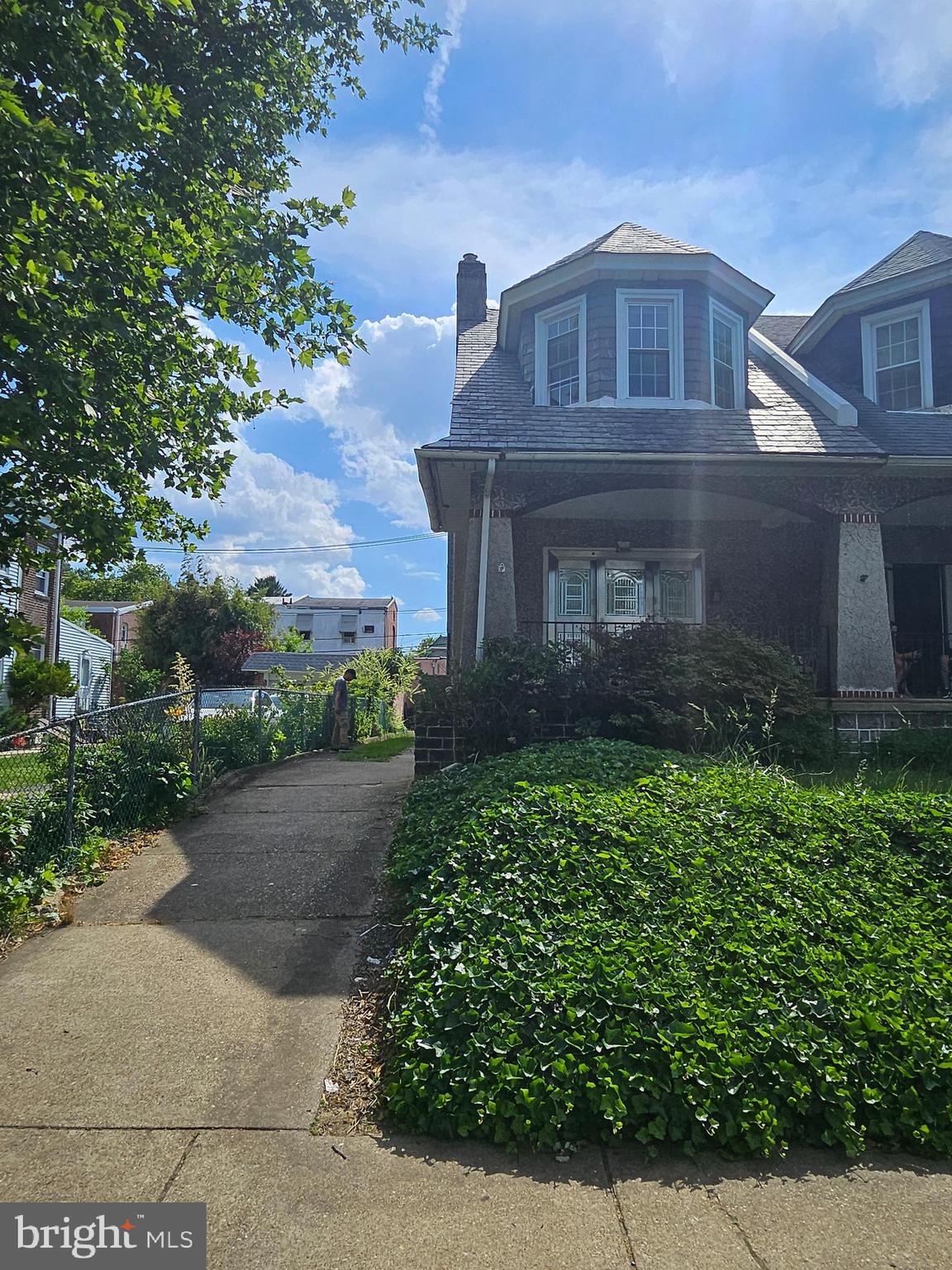 This beautiful twin house is located on a quiet, tree-lined street in Mayfair. The property features a long driveway, a welcoming front porch, and a spacious backyard. Inside, the home offers a large living room with a gas fireplace and ample natural light, leading into a separate dining area and an updated kitchen complete with new cabinetry, granite countertops, a new stove, and a stainless steel refrigerator. The interior has been recently renovated with vinyl flooring and fresh paint throughout.

The upper level contains three generously sized bedrooms and a full bathroom, including a primary bedroom with dual closets. The outdoor space includes a covered patio for year-round use, a lawn, and a paved area designated for grilling and entertaining. Additional features include a finished basement with a half bath, dedicated storage, and laundry space.

This home is in move-in-ready condition.  Don't wait to schedule your showing today!