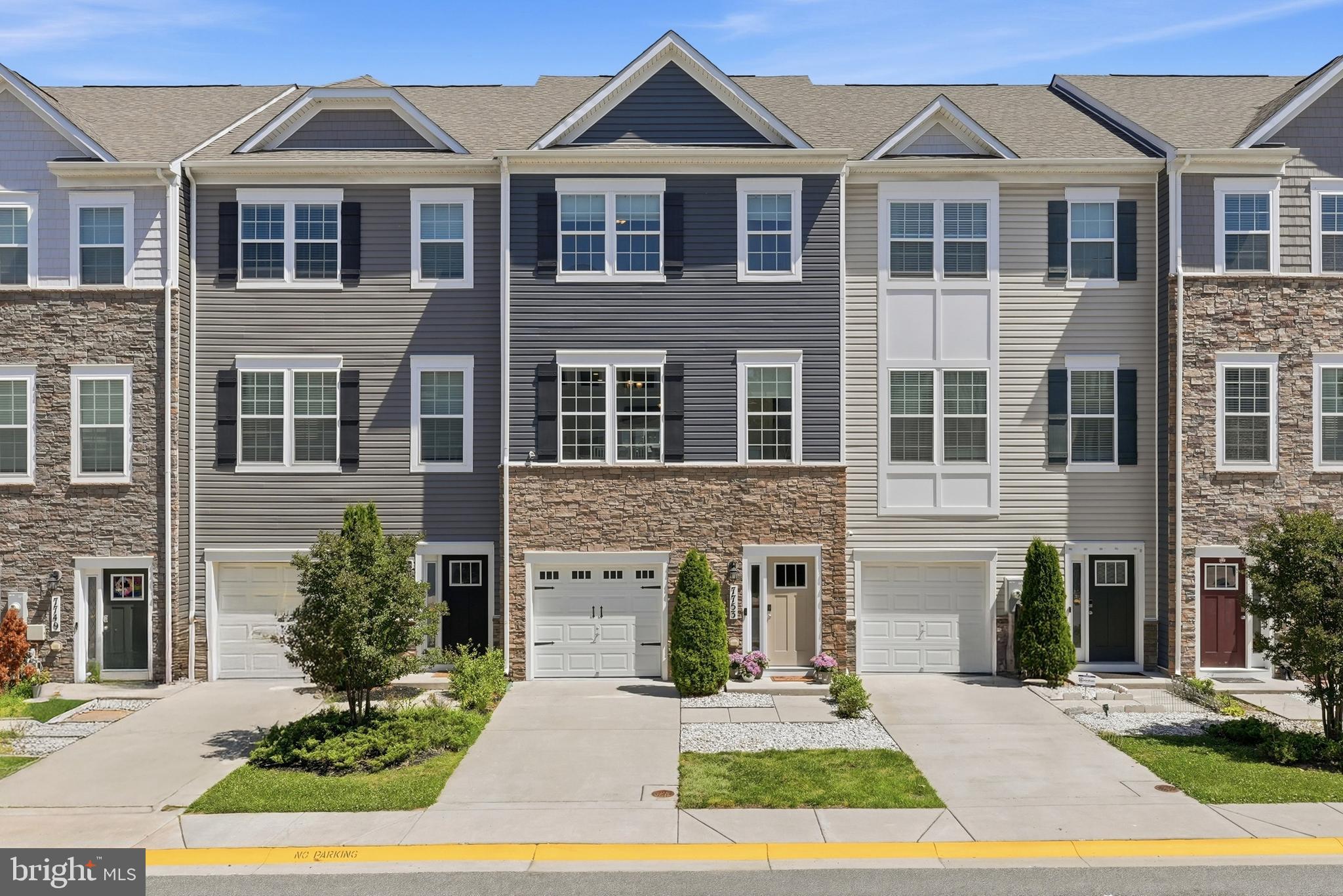 Welcome to this beautifully appointed three-level townhome in the sought-after Severn Meadows community, offering the perfect blend of style, comfort, and functionality. With striking curb appeal, a one-car garage, and private driveway, this home makes a lasting first impression from the moment you arrive.

Step inside to a welcoming foyer that leads to a bright and versatile recreation room, complete with recessed lighting and sliding glass doors opening to your fenced in backyard. Whether you're looking for a cozy retreat, home office, gym, or entertaining space, this flexible lower level adapts to your lifestyle. 

The main living level is designed for modern living, featuring an open-concept layout filled with natural light. The spacious dining area flows seamlessly into the heart of the home: a beautifully designed kitchen showcasing an oversized center island with bar seating, stainless steel appliances, built-in cabinetry, recessed lighting, and abundant prep and storage space. The adjoining living room offers a warm and inviting atmosphere, while sliding glass doors lead to the rear deck, creating the perfect indoor-outdoor living experience. A convenient powder room completes this level.

Upstairs, the spacious primary suite serves as a private retreat, featuring a walk-in closet and an elegant ensuite bath with dual vanities and a glass-enclosed walk-in shower with built-in seating. Two additional bedrooms, a well-appointed hall bath, and a dedicated laundry room provide comfort and convenience for family and guests alike.

Thoughtfully designed throughout with functional living spaces, abundant natural light, and contemporary finishes, this move-in ready home offers exceptional versatility and everyday comfort.

Located in the desirable Severn Meadows community, residents enjoy an array of amenities including playgrounds, tot lots, basketball courts, a dog park, and open green spaces. The location is also convenient, near shopping, dining, commuter routes, and a variety of local services and attractions.