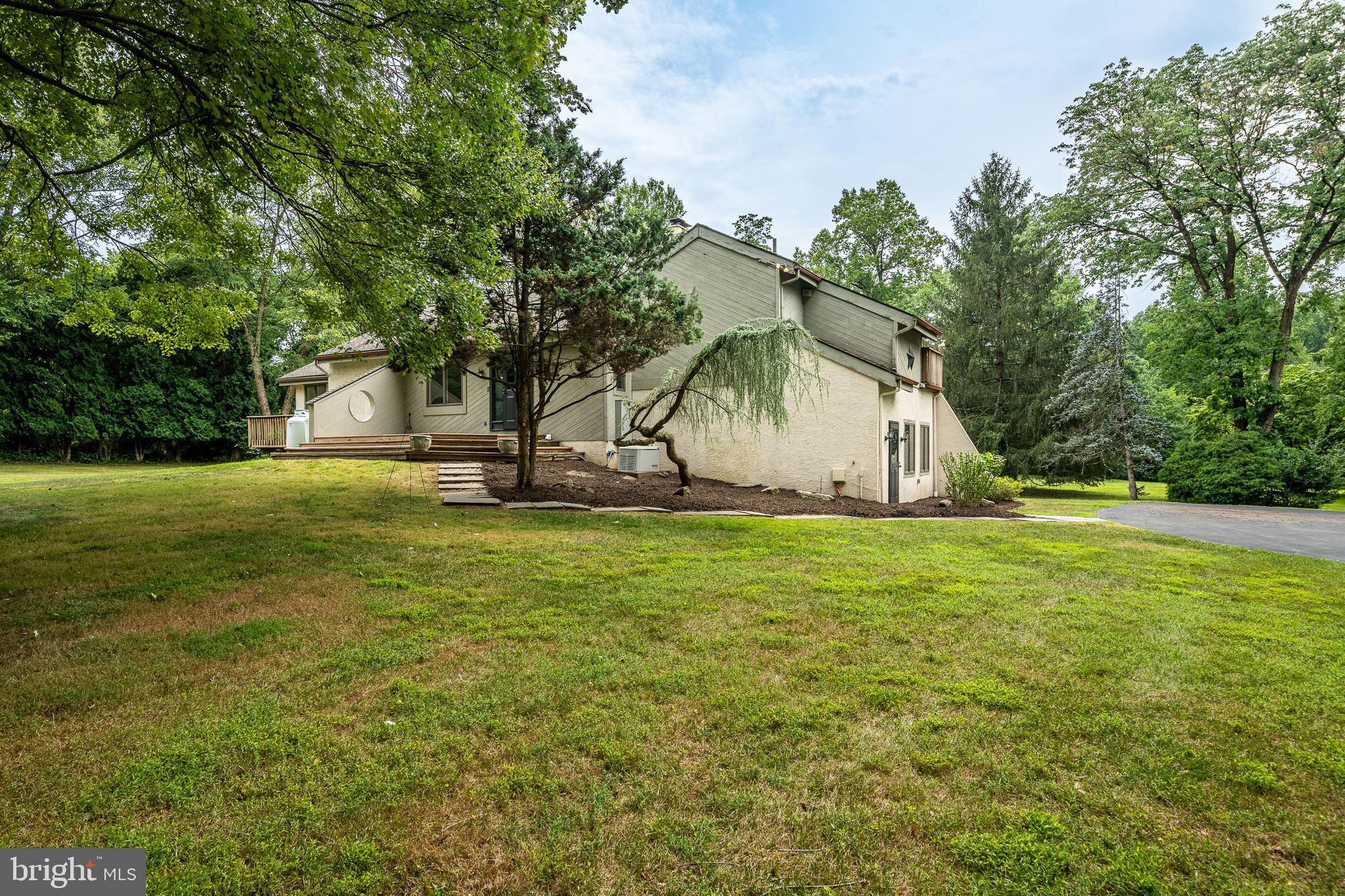 OPEN HOUSE CANCELED . House under agreement. 
4 acres!! Add a barn and Bring your horse.Property Backs to horse trails. Hack to Radnor Hunt!  
Solid  contemporary home in Radnor Hunt with vaulted ceilings in the living room, breakfast room, kitchen and family rooms. Family room wrapped in windows. Heart of WIllistown. Features a 3 car extra long garage with storage above and 2 car tandem garage behind. Two Quonset huts for boats or horse trailers. 2 large sheds for wood storage. Tiled Foyer, Dining room, Living room with Vaulted ceiling and 2 story wood burning brick fireplace . Kitchen with vaulted ceilings.   48" Maple cabinets. Granite counters. Stainless appliances. Open floor plan.  Breakfast room with vaulted ceilings and skylight.  Main bedroom with vaulted ceiling and skylight and private deck. 
GeoThermal heat. Generator on Property
Original attached garage finished into a workshop/ workout room/art studio is flooded with light for an additional 600 square feet. 
Second family/Game room on lower level with full bath and 2 additional bedrooms. Large circular driveway.