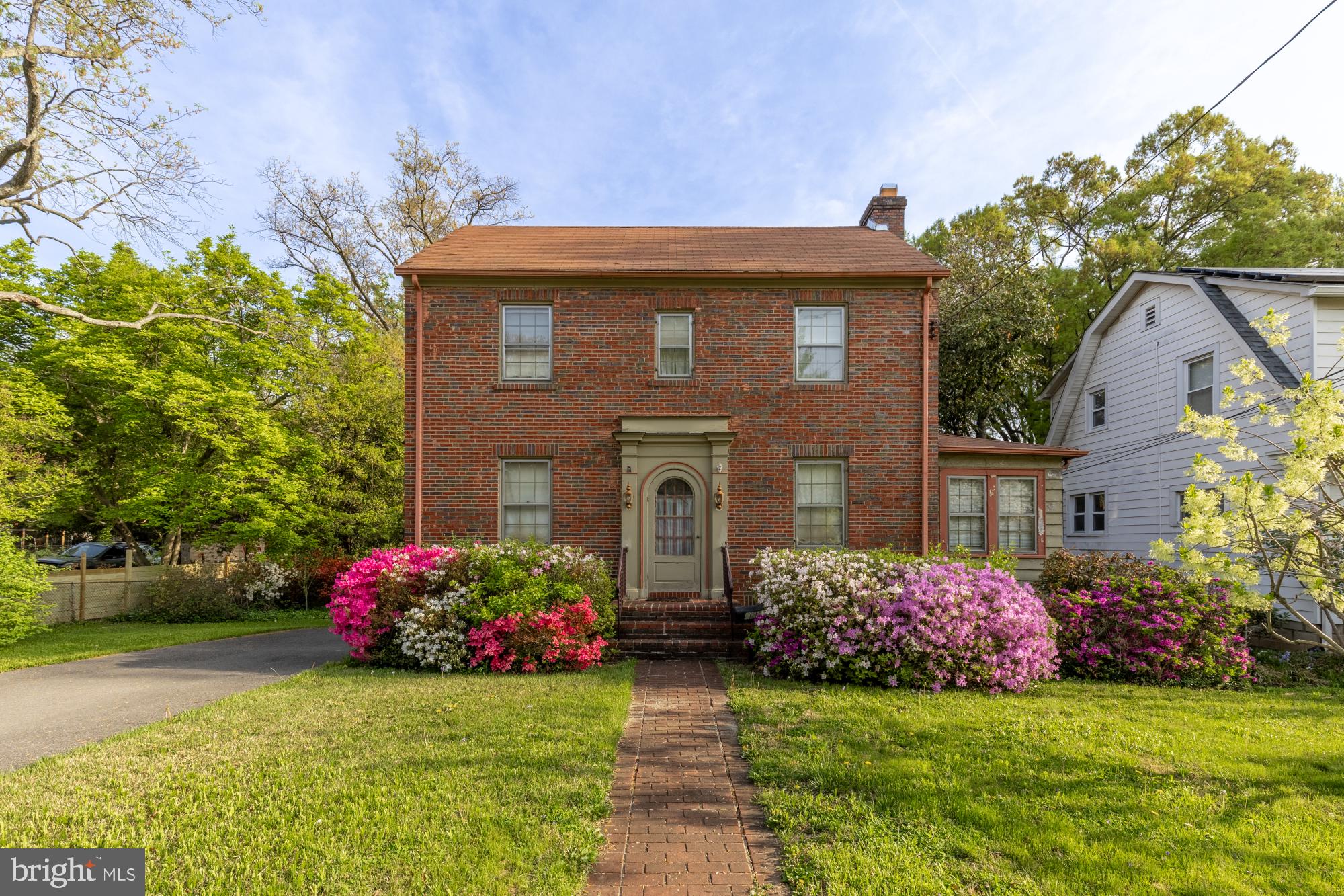 Tucked into one of University Park's most beloved streets, this warm brick colonial has belonged to a single family for almost 60 years, and it shows in all the right ways. The bones are exceptional, the details are original, and the love poured into this home over six decades is evident in every room. Huge windows, original hardwood floors, and classic millwork greet you upon entry and continue throughout the home.

Upstairs, three comfortable bedrooms carry that same warmth and character, each one a reminder of how well homes were built when builders took their time. Outside, the yard is a standout feature, with a lot and a half giving you generous space to garden, entertain,  expand the home, or simply enjoy a backyard that actually feels like a backyard. Homes with this much charm, this much history, and this much space don't come along often, and when they do, they don't last.