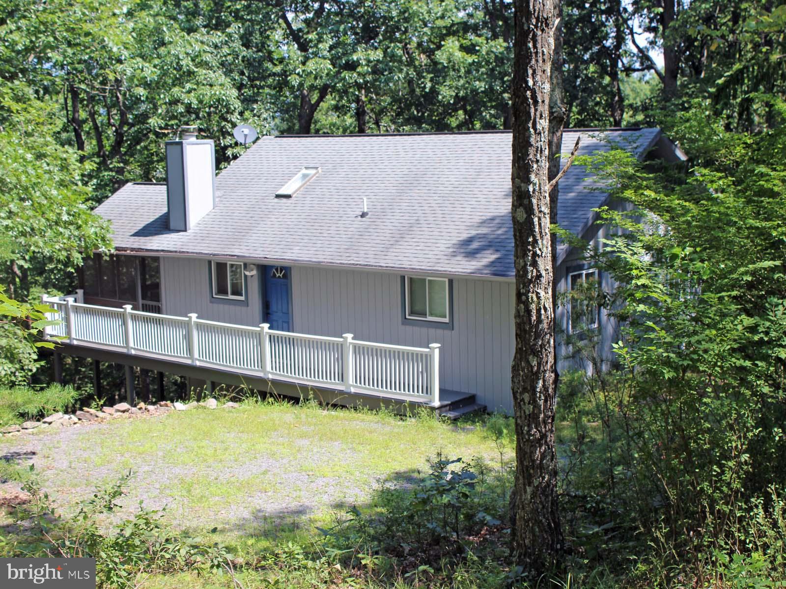 Back on the market with new paint and floors in the spacious basement, exciting decorative accents, comfortable furnishings throughout and just minutes from the Bryce Core area. Located on popular Mallard Drive, this gem has "family" written all over it! From the open floor plan to the large screened porch with a ceiling fan for those really hot days to the open deck for sunbathing and grilling, this one has it all! Situated in a very private, but accessible setting this home has 3 Bedrooms and 3 baths, and it's all in move-in condition! The tasteful furnishing will accommodate up to 8 fun-lovers. The deck and screened porch offer lots of trees and winter views and sunsets to the west. The main floor Great Room features a cozy corner fireplace, a well designed kitchen and two sliding glass doors; one leads to the deck and one to the large screened porch. The main level features a Primary bedroom with a private bath, a hall bath and a second bedroom. On the fully finished lower level you'll find a large, inviting family room, a hall bath and a bonus sleeping area or office! You'll also find a large enclosed space for storing skis, bikes, golf clubs and more. There's a spacious laundry/utility room, too! Closets are plentiful throughout and the floors, walls and upgraded windows are all first rate! Situated on a large .80 acre lot, the home is minutes from skiing, golf, Lake Laura and all that Bryce Resort has to offer.  Don't miss this great opportunity!
Facts: Trex decking added 2023, windows and doors replaced 2023, pex piping installed 2023, heat pump replaced in 2012, downstairs bathroom installed 2002.