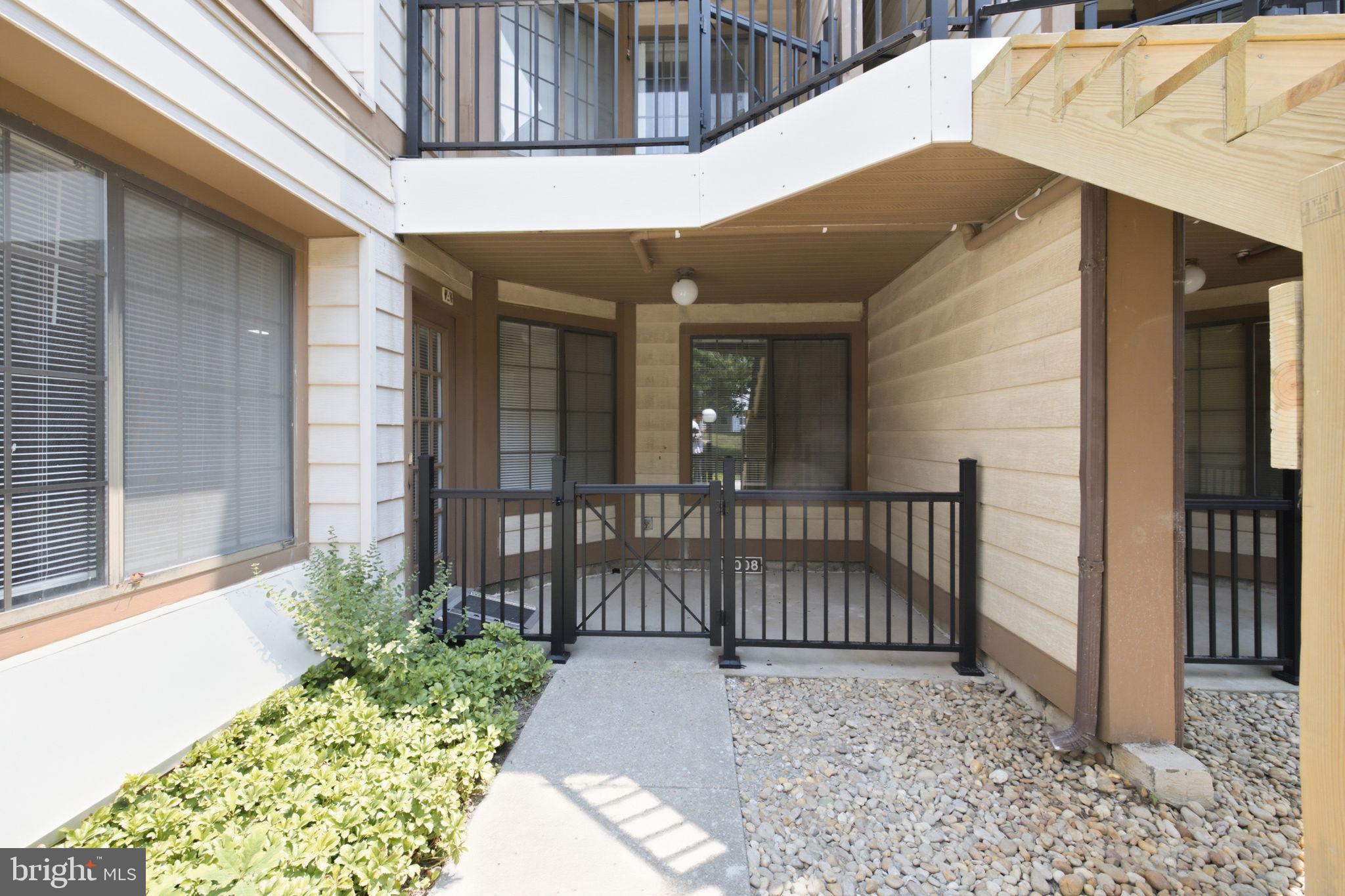 Enjoy comfortable, updated on the street level unit. Nestled in the heart of Laurel, it is in a great location Just off of Route 1, close to RT200 and major routes, short walking to shopping centers and public transport. This updated, delightful Street level condo offers a unique blend of space, light, and practical features. Park your car on the large and deep 1 car garage, step into the updated kitchen, enjoy top ceiling in the 2nd bedroom/office. The brand new walk in shower is wheel chair accessible. There is also a good size fenced private patio for you to enjoy. CASH, VA, NON-warranted Condo Conventional loan.