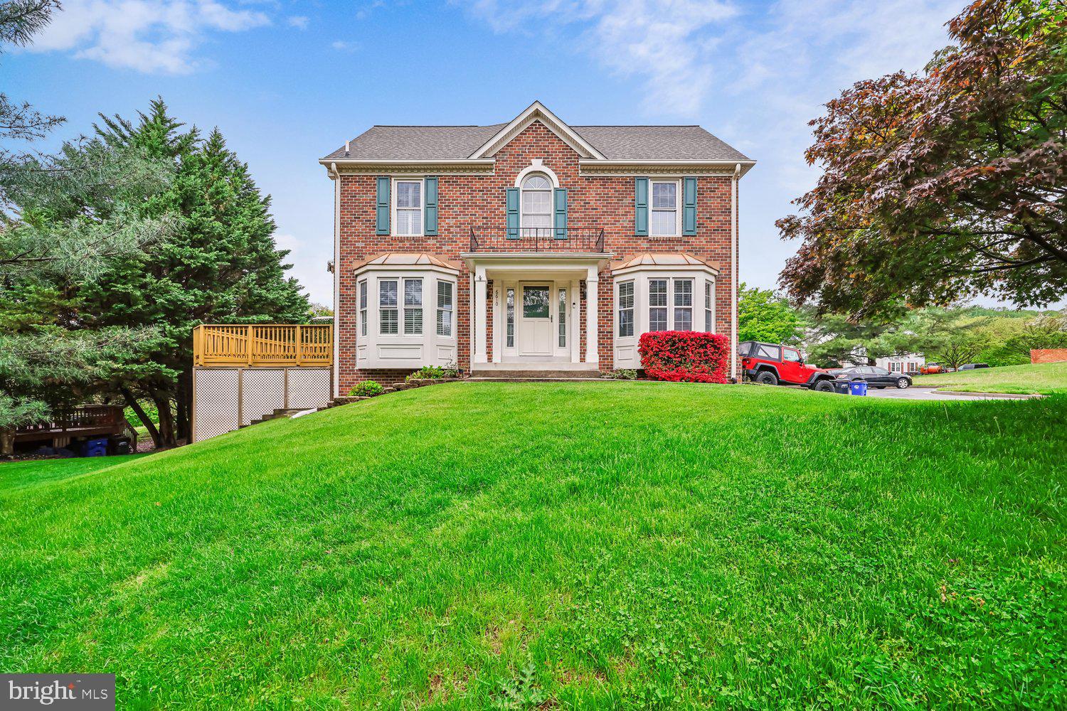 NEW PRICE!  Welcome to this rare three level 2,400 + sq. ft brick front end unit townhome in North Shore, Lake Linganore.  Two-story sunlit foyer with hardwood flooring leading  to formal dining room and adjacent living room both with bay windows and custom window treatments throughout; kitchen boasts cherry cabinetry, upgraded appliances and granite countertops with center island; separate eat-in breakfast area with ceramic tile flooring and family room with access to deck with retractable awning perfect for entertaining;  upper-level features two bedrooms, a primary bedroom suite with walk-in closet, luxury bathroom with designer ceramic tile flooring, dual vanities, separate walk-in shower and soaking tub; spacious second bedroom with  two double-door closets and en-suite bathroom with tub/shower; fully finished walk-out lower level with recreation room, third bedroom with slider to backyard and covered deck, laundry/storage area all with hardwood flooring and full bathroom.  Community rich amenities are right around the corner including pool, tennis courts, hiking trails, Coldstream Beach, lake and tot lot. Community hosts annual events including summer and fall festivals, 4th of July and New Years gatherings. Conveniently located near shopping, dining and major commuter routes. The Lake Linganore lifestyle awaits you!