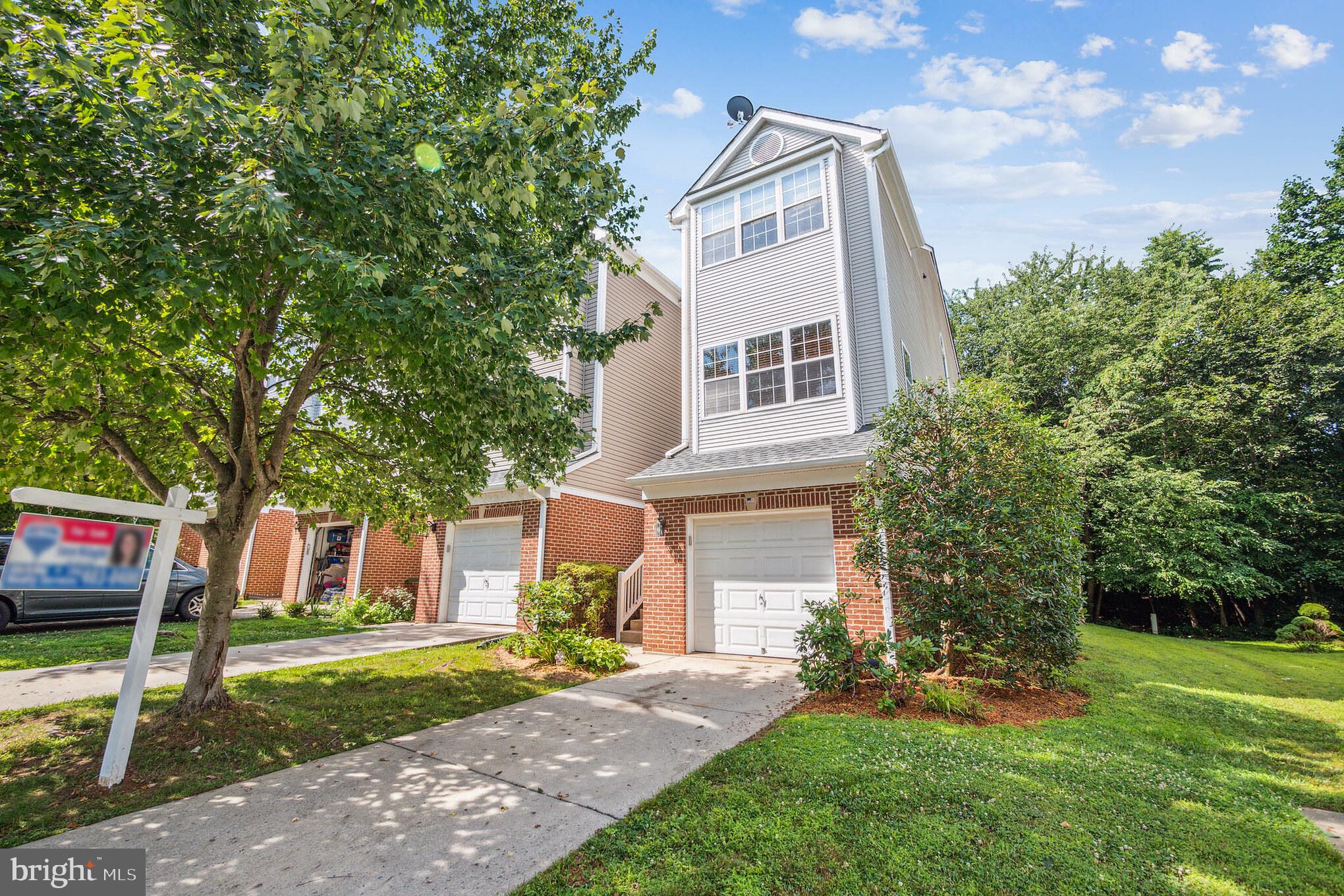 Welcome to 13616 Crusader Way Germantown, MD! Fantastic rarely available end unit townhouse in Germantown Estates. This luxurious 4 bedroom and 4 bath Colonial features over 3,000 finished square feet of stunning updated finishes throughout the interior. Blue Ribbon schools, close to shopping, public transportation and major highways. A MUST SEE!

Highlights include its bright, open in-kitchen dining area features, stainless steel appliances, beautiful hardwood floors, and one of only two units approved to ever have a fenced backyard in this community make this home even more of a standout!

East facing front accented by manicured side garden captures the morning sun. The garage and driveway parking are complimented by community parking adjacent to home.

The two story foyer w/palladium window offer separation into unit! A spacious living room with half bath gets sunlight throughout the day and open, airy main living area features unifying accent wall leading to dining area.

Dining room features chandelier and kitchen facing granite top bar. windows showcasing beautiful wooded back of lot.

Bright, open in-kitchen dining area features beautiful, wooded views offering three sunlit exposures (windows on three sides with Hunter Douglas blinds). Kitchen dining area with chandelier and TV wall mount.

French doors to the main level den and bedroom offering tons of natural light through its three sunlit exposures. A huge half bath on main level provides loads of storage space and functionality.

West facing deck backs directly to protected bird sanctuary and privacy from neighbors.
Large deck accommodates full outdoor dining set, multiple lounges and large grill with room to spare.

Massive Master Bedroom features 15+ ft. vaulted ceiling, enormous walk-in closet with built in storage and shelving. Double doors to this luxurious master suite with vaulted ceilings.

 Master bath with  Jacuzzi tub, separate shower, double vanity basin. Bright bath with cornered windows overlooking woods and linen closet.

3rd Bedroom has full wall of closet space with bi-fold doors and east facing windows.
 Large 4th bedroom has East faced windows and walk-in closet with built-shelving, clothing racks. Recessed entry door and walk-in closet to 4th Bedroom. Bedroom level full bath with shower and tub offers easy access for 3rd and 4th bedrooms.

Daylight walkout spacious family room with gas fireplace & 9 ft. ceilings (only unit in community with 9ft ceilings in lower level).

Ground level full bath with standing shower.
Utility room houses washer/dryer and utility sink. Ground level storage room with walk-in closet adds small 5th bedroom potential.

Sliding door and large windows provide afternoon light in the family room, end unit offering larger lot. One of only two units approved to ever have a fenced backyard in this community make this home even more of a standout!