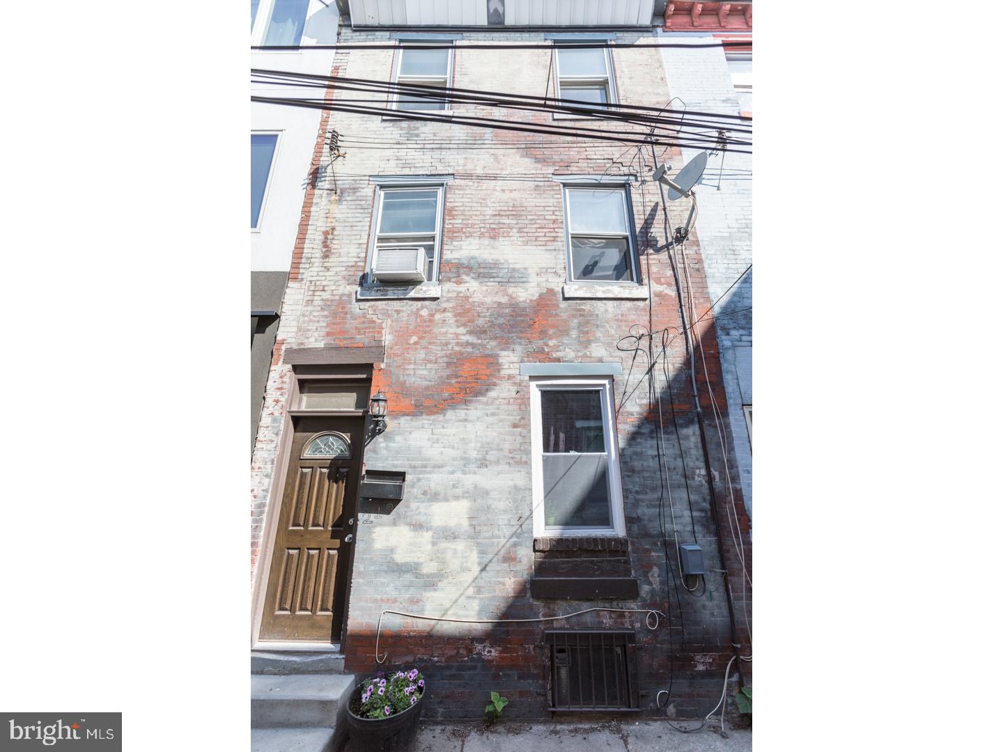 Welcome to 219 Mercer St, a charming and historic brick front Fishtown row, nestled on a quaint and private block just steps away from the Frankford & Girard corridor. This 3 story home boasts over 1,300 sq ft of living space with 3 beds, 1 bath, unfinished basement with laundry area and plenty of storage space, as well as a great backyard perfect for gardening, grilling, & chilling. The first floor offers a formal living room in addition to the modern eat in kitchen with breakfast bar island, dishwasher, and granite countertops. The second level offers a spacious bedroom with walk in closet and the full hall bath. Third floor consists of one large bedroom and one smaller bedroom along with a hall closet. Hardwood and laminate floors throughout. Situated just 2 blocks from Frankford and Girard ave, now is your opportunity to make the amazing neighborhood of Fishtown your home. We welcome your visit today!