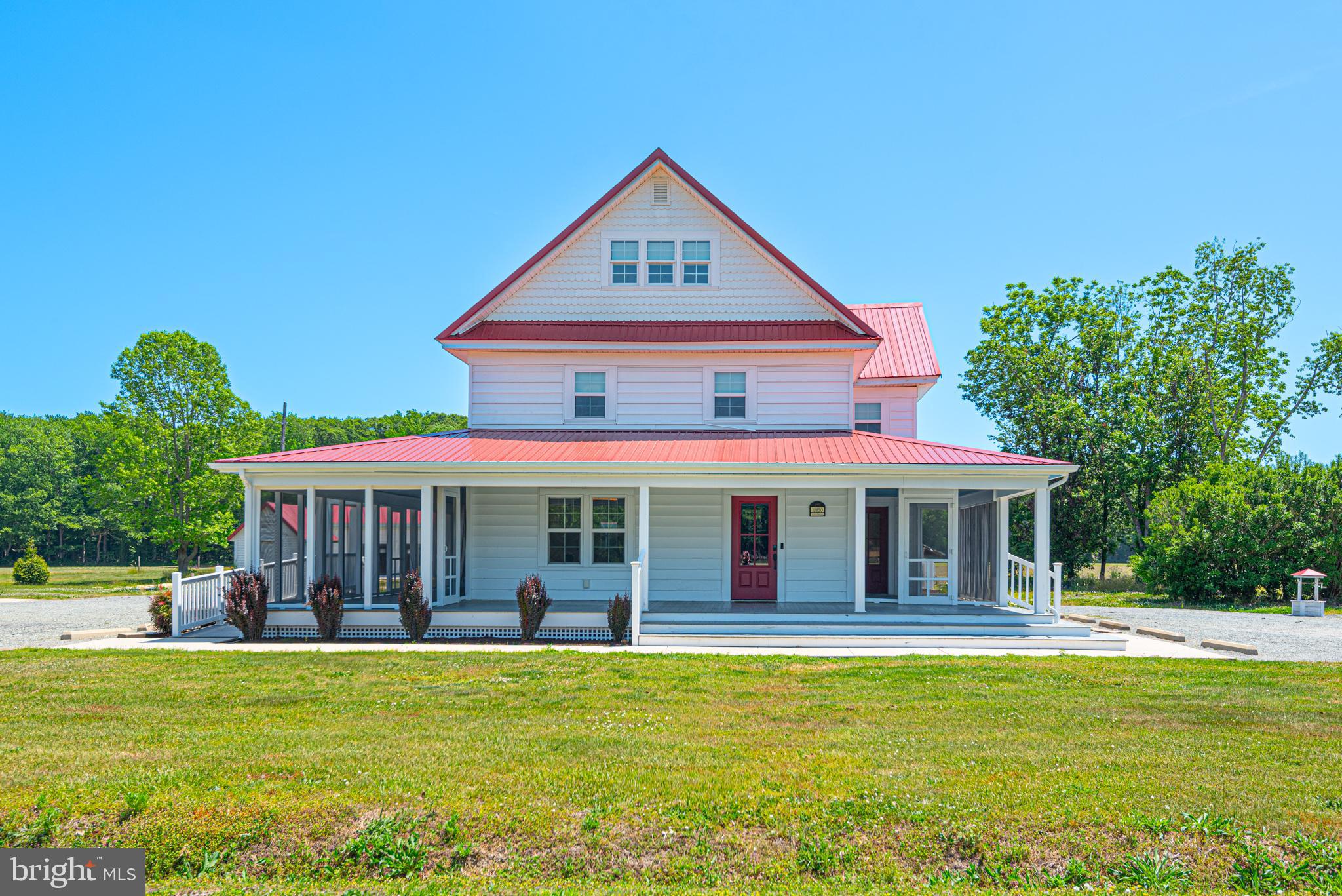 Stunning restored  Farm House on 6.49 acre mini-farm .   3 bedroom,  4 baths, featuring bonus room on 3rd level.  Imagine your morning coffee on  a wraparound porch  - an easy escape to tranquility.     Enter through front door to living area that flows to country kitchen/dining area, featuring massive high end kitchen island.  Spacious open pantry for storage.  Charming vintage-style clawfoot soaking tub 2nd floor level.  Luxurious freestanding wooden soaking tub main level.  Central air main and 3rd level.  Mini-splits 2nd level.
Take party outside to  a entertainers dream featuring  enclosed party room with inground  heated pool. (pool heated by leased  propane)   An additional  out  building complete with electricity and loft, convert to many uses.  Enjoy worry free  metal roof  2020.   Generous parking area.   What's a farm without a grand Barn to make it complete. ! Home is a perfect blend of county living and modern conveniences. This is a unique one of a kind  Farm House. Minutes from Ocean city, Assateague Island &Town of Berlin . If entering hatchery use caution.