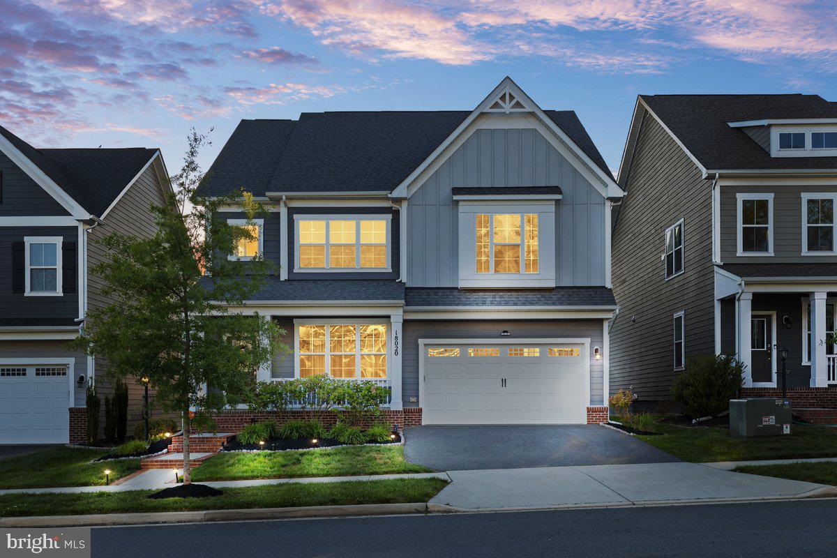 ***Exceptional buyer incentive: Save up to $20,000 with seller-paid closing costs, plus a 1% lender credit for qualified buyers through Embrace Home Loans!*** Welcome to 18020 Cedar Grove Lane — a beautifully appointed Beckner model located in the highly sought-after Potomac Shores community, where elevated living meets everyday comfort. Offering over 4,600 square feet, this residence combines spacious interiors, refined finishes, and the lifestyle today’s buyers are looking for. Featuring 4 bedrooms, 4 bathrooms, a 2-car garage, and a screened-in deck with retractable privacy shades, this home makes an impression from the moment you arrive! Step inside and you’re immediately greeted by light-filled spaces, luxury vinyl flooring throughout the main level, and elegant chair rail molding that adds a sophisticated touch throughout. The layout flows effortlessly, beginning with a versatile front living space ideal for a formal living room or dining room before opening into the true heart of the home. The rear living space seamlessly connects the grand room, dining room, and gourmet kitchen to create an open yet inviting atmosphere. The kitchen is both functional and beautifully designed, featuring granite countertops, an oversized island, gas cooktop with a statement hood, built-in wall oven and microwave, and abundant cabinetry that perfectly balances style and storage. Just beyond, the enclosed deck offers the perfect private escape for slow mornings, evening gatherings, or simply enjoying the comfort of home year-round. The main level also features a powder room, a bonus room ideal for a home office or play room, and a customized mudroom conveniently located off the garage entry. Upstairs, the spacious loft offers the perfect flex space for lounging, a reading nook, or a secondary living area. The primary suite feels like a true retreat, complete with a vestibule entry, dual walk-in closets, and a spa-inspired ensuite bath featuring separate vanities and a large walk-in shower. Three additional bedrooms, a full hallway bath, and an upper-level laundry room complete the upper level. The finished basement adds another layer of versatility to the home, beginning with a generously sized recreation area perfect for entertaining, relaxing, or everyday living. This level also features a full bathroom, custom barn doors that open to a secondary recreation space ideal for a media room, lounge area, or home gym, as well as an unfinished bonus room offering additional storage or future customization potential. Notable features of the home include a radon mitigation system, exterior sprinkler system, and the added peace of mind of a one-year home warranty included with the purchase! Beyond the home itself, Potomac Shores offers a lifestyle that is truly unmatched - residents enjoy access to resort-style pools, the Social Barn, Fitness Barn, Jack Nicklaus Signature Golf Course, Tidewater Grill restaurant, scenic walking/biking trails, basketball court, playgrounds, and peaceful views along the Potomac River. The HOA also includes high-speed internet and trash service, while easy access to I-95,  Quantico, and the future VRE station adds to the convenience of everyday commuting and travel.  Don’t miss the opportunity to purchase in one of the area’s most sought-after and steadily growing communities!! Schedule your tour today!