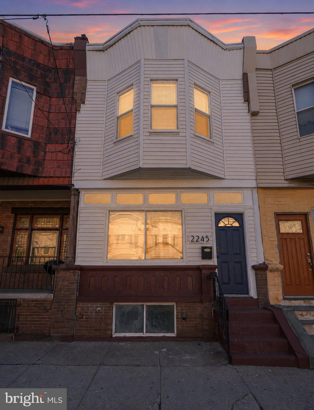Welcome to 2245 S 22nd St: Where South Philly Character Meets Modern Living
Situated on a wide, welcoming block in the heart of South Philadelphia, this beautifully updated 4-bedroom, 2-bathroom row home is the perfect blend of historic charm and contemporary comfort. From the moment you arrive, the original leaded glass entry doors set the tone: a home that honors its roots while delivering everything today's buyer expects.
Step inside to find refinished original hardwood floors flowing throughout the main level, bathed in natural light from the sunny enclosed front porch, your new favorite spot for morning coffee or a quiet evening read. Fresh, neutral paint and all-new light fixtures create a bright, move-in-ready canvas from top to bottom.
The brand new kitchen is a true showstopper, featuring a designer tile backsplash, sleek stainless steel appliances, generous cabinet space, and a large pantry with everything the home chef needs to entertain or unwind. Step out back to a clean concrete yard perfect for summer BBQs and gatherings with friends.
Upstairs, four spacious bedrooms offer room for everyone, complemented by a beautifully renovated full bathroom with tub, modern tile surround, and all-new vanity, plumbing fixures, and light fixtures.
The finished basement adds tremendous value with a freshly carpeted bonus living or storage space, a second full bathroom with stall shower, and a dedicated laundry area with washer and dryer included.
Comfort year-round is guaranteed with a brand new HVAC system featuring central air and heat.
All of this in a prime South Philly location, minutes from top-rated restaurants, shopping, public transit, major highways, and the iconic Stadium District.
This one checks every box. Come see it before it's gone.