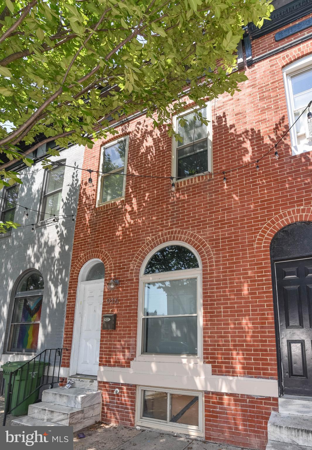 List price is Opening Bid at the Online auction to be conducted on Auctioneers website. - Auction ends Wednesday, July 22, 2026 at 11:00 AM. This solid brick townhouse offers a practical layout and excellent functional features. The main level includes a carpeted living and dining room, an eat-in kitchen, and a dedicated laundry space right in the kitchen area. Upstairs, the home features two bedrooms, a versatile bonus room that can serve as an office or extra storage space, and one full bathroom. Carpet runs throughout the entire upper level. The exterior includes a fully fenced yard with a patio and a dedicated deck walk path and ramp designed for wheelchair accessibility. A full, unfinished basement provides plenty of room for storage and houses the property's utilities. Location & Community Features Milton-Montford offers exceptional convenience and connectivity, located just a 5–10 minute drive from downtown Baltimore, Johns Hopkins Hospital, and Patterson Park. Residents enjoy easy access to Frank C. Bocek Park as well as Patterson Park's trails, athletic fields, pool, and community events. The neighborhood is well-connected to the regional highway network, featuring convenient access to: • Interstate 83 via downtown. • Interstate 95 via the downtown and harbor area. • Interstate 895 for direct access to the southeast and the harbor tunnel. • U.S. Route 40, which runs just north of the neighborhood and serves as a major regional corridor.